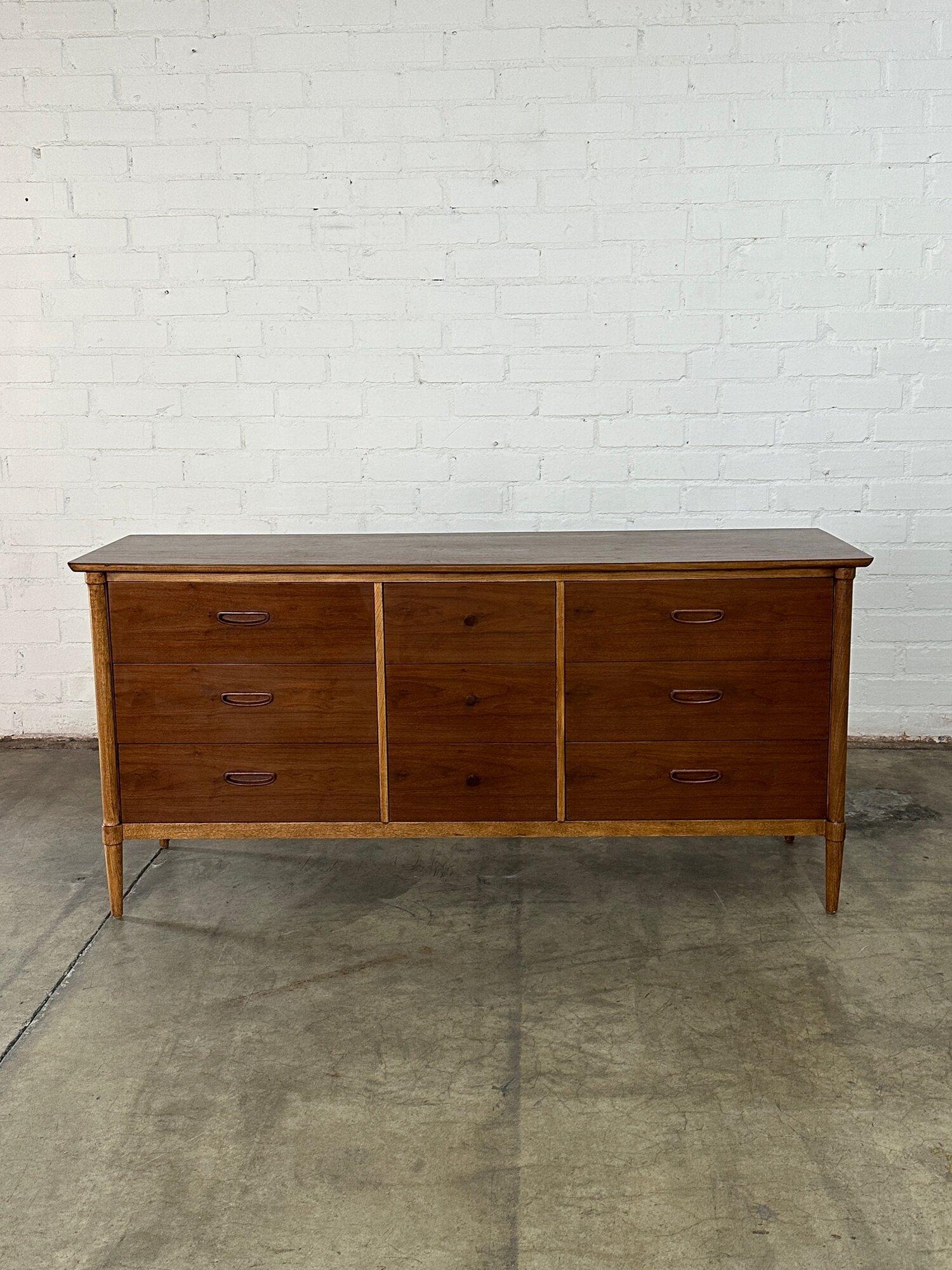 W66 D18 H31.75

Mid century dresser by Lane in fully restored condition. Item features sculptured handles and  two different wood types. Dresser is structurally sound and fully functional. 