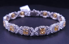 Two Tone Elegant Bracelet in 18K Yellow / White Gold with Diamonds