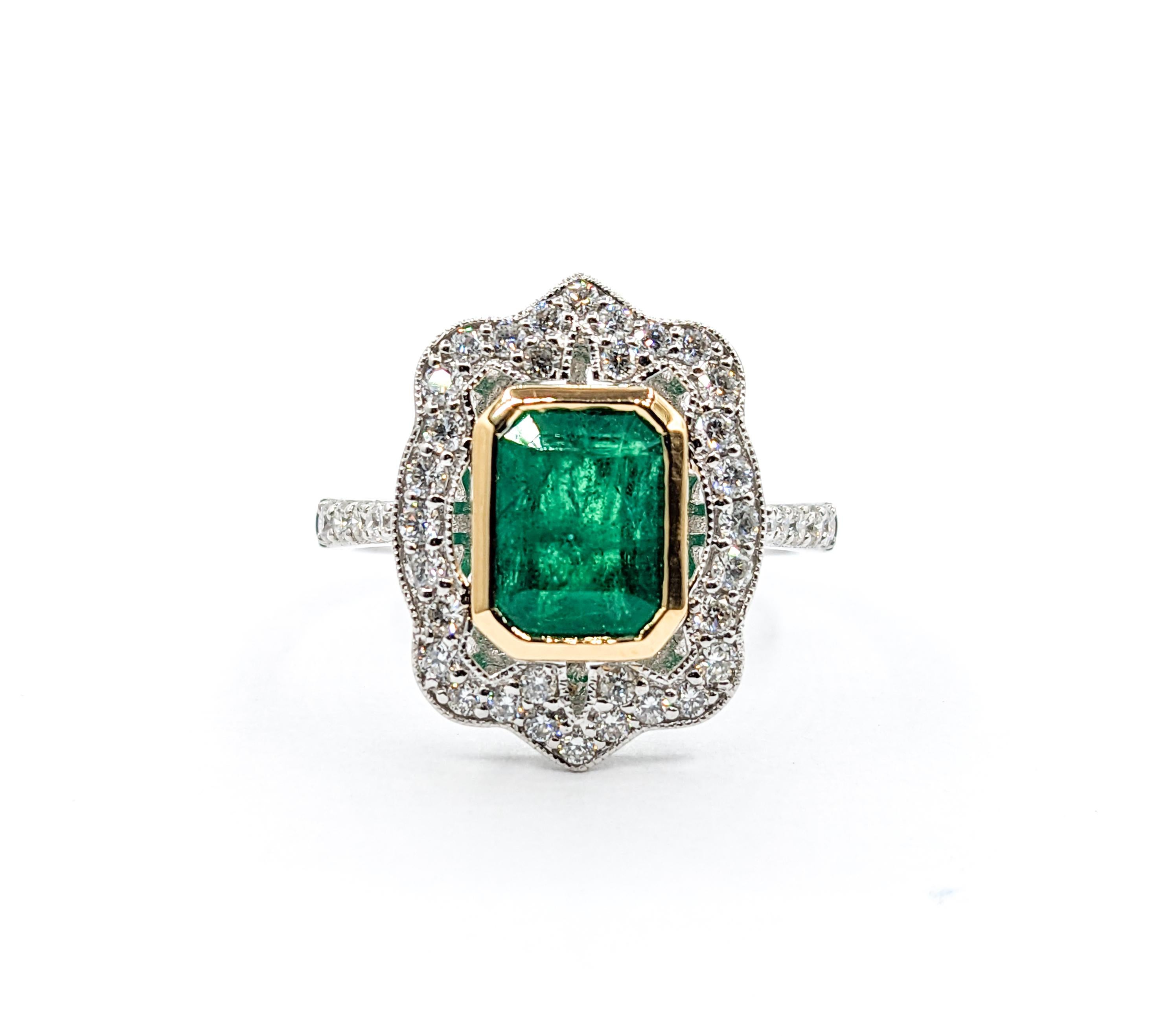 Two-Tone Emerald & Diamond Cocktail Ring

Experience the allure of this exquisite ring, crafted with precision in 18kt white & yellow gold. It features an array of .53 carats of round diamonds, each with an I clarity and a near-colorless white