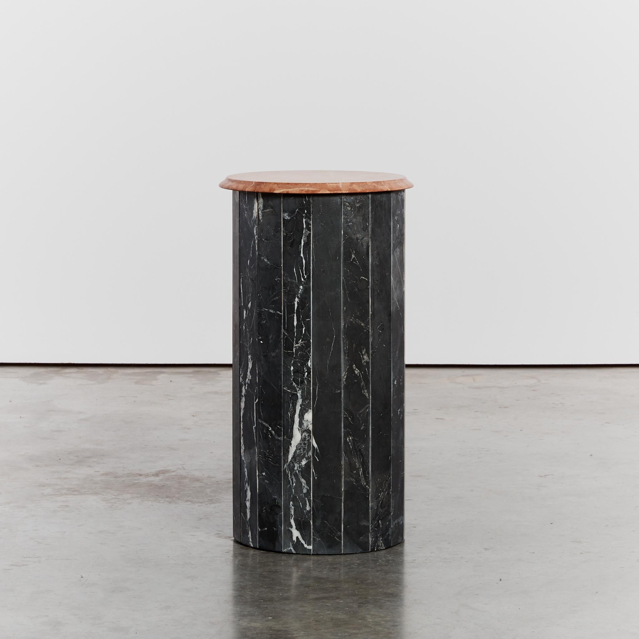 From the personal collection of Belgian dealer and collector Paul Grande, this marble plinth is made from a contrasting pair of a faceted black marble base and Alicante marble top. Freshly honed.

Material: Maquina, Alicante marble

Dimensions: