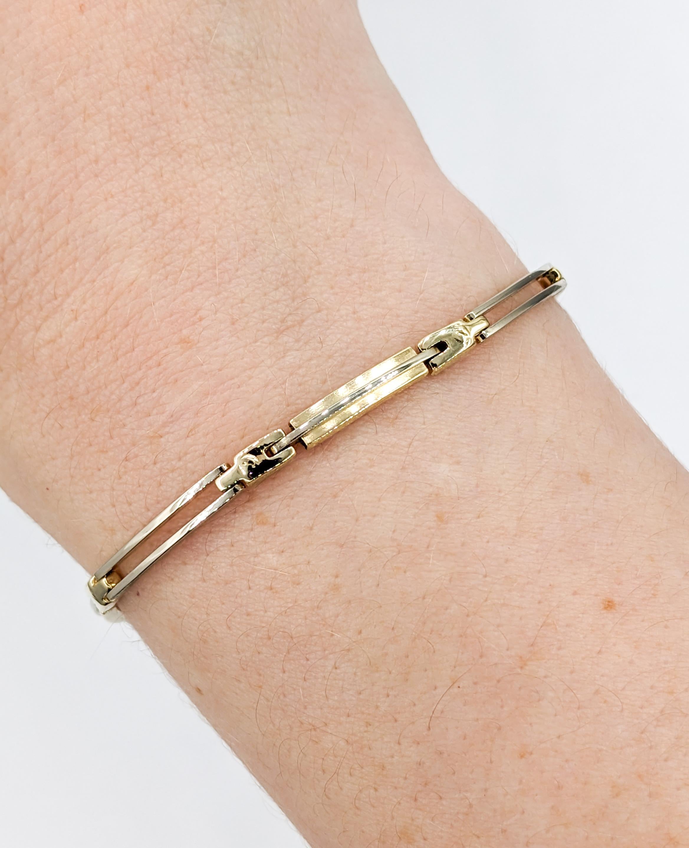 Two Tone Fancy Link Bracelet in 14 karat Yellow Gold

Elevate your style with our stunning two-tone link bracelet, a true embodiment of elegance and sophistication. Crafted with meticulous attention to detail, this beautiful bracelet is designed to
