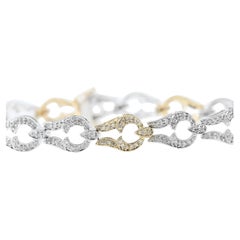 Bracelet en or 18K avec diamants pavés incolores et jaunes fantaisie