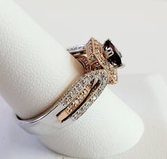 Two Tone Garnet and Diamond Ring set in 14K White and Rose Gold