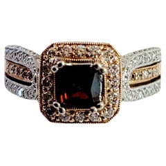 Two Tone Garnet and Diamond Ring set in 14K White and Rose Gold
