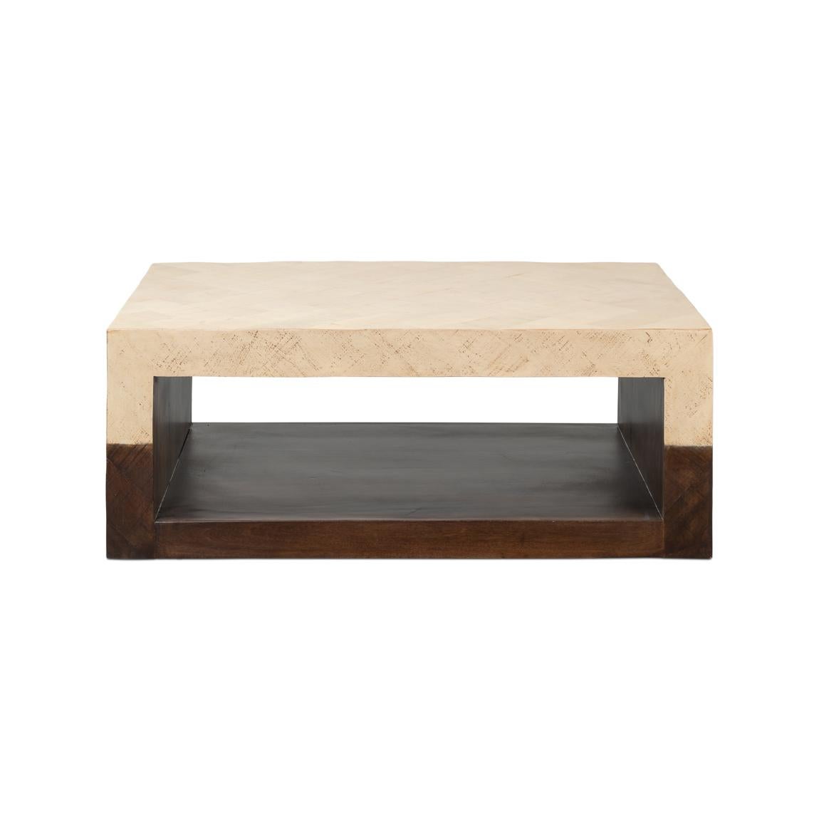 The coffee table emerges as a centerpiece that masterfully unites contrasting shades and intriguing forms. It embodies the essence of contemporary design, injecting a revitalizing slant on modern aesthetics. The distinctive geometric interplay