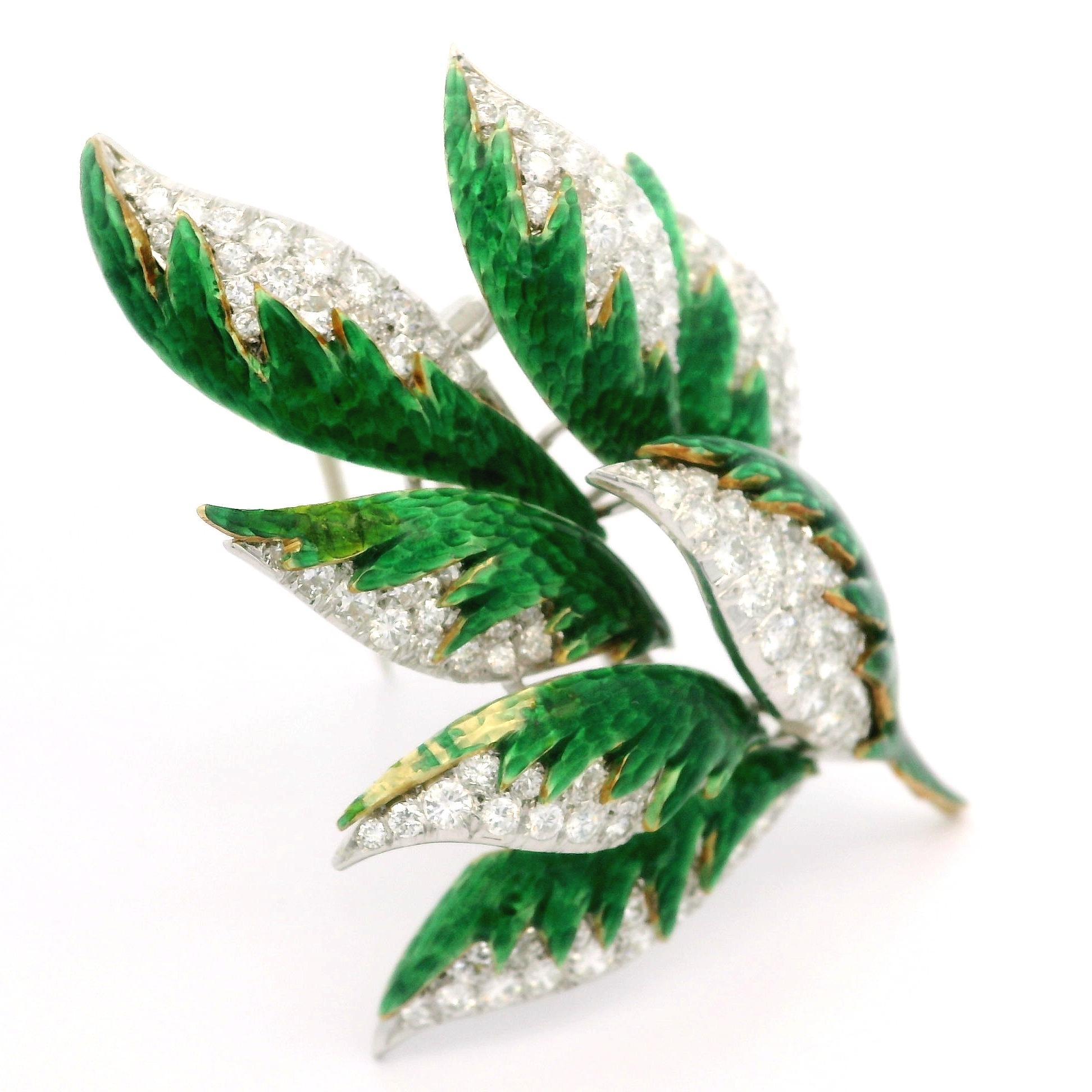–Stone(s)–
(Numerous) Natural Genuine Diamonds - Round Brilliant Cut - Pave Set - Nice Brilliant White Color - 3.20ctw (approx.)

Material: Solid 18K Yellow & White Gold - Vivid Green Enamel
Weight: 24.54 Grams
Overall Height: 61.32mm (2.41