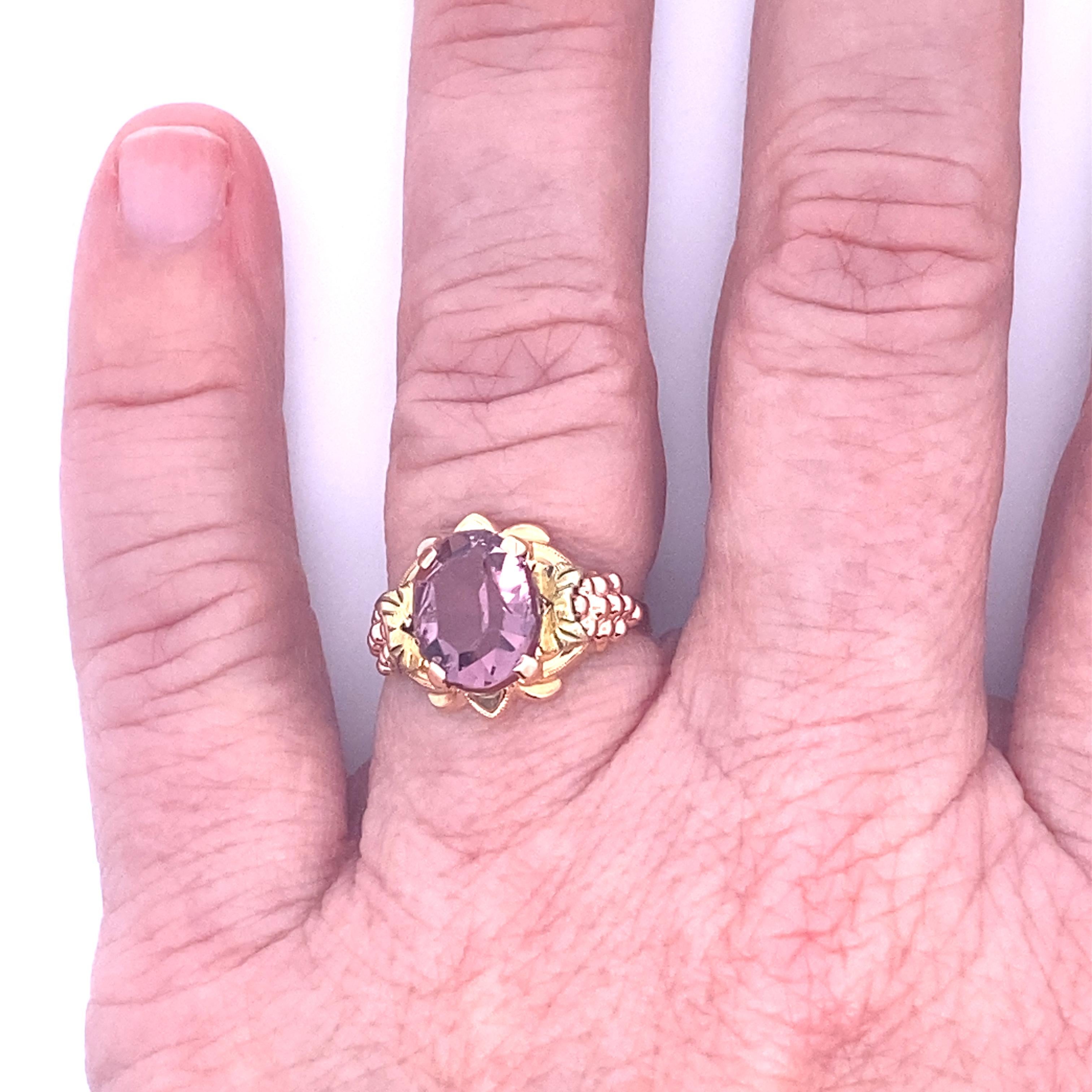 10k rose and yellow two-tone gold amethyst ring. Size 4.5 US. 1.1Dwt