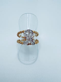 Zweifarbiger Goldring mit Diamantakzenten, doppelt geflochtenes Band, CIRCA 1980