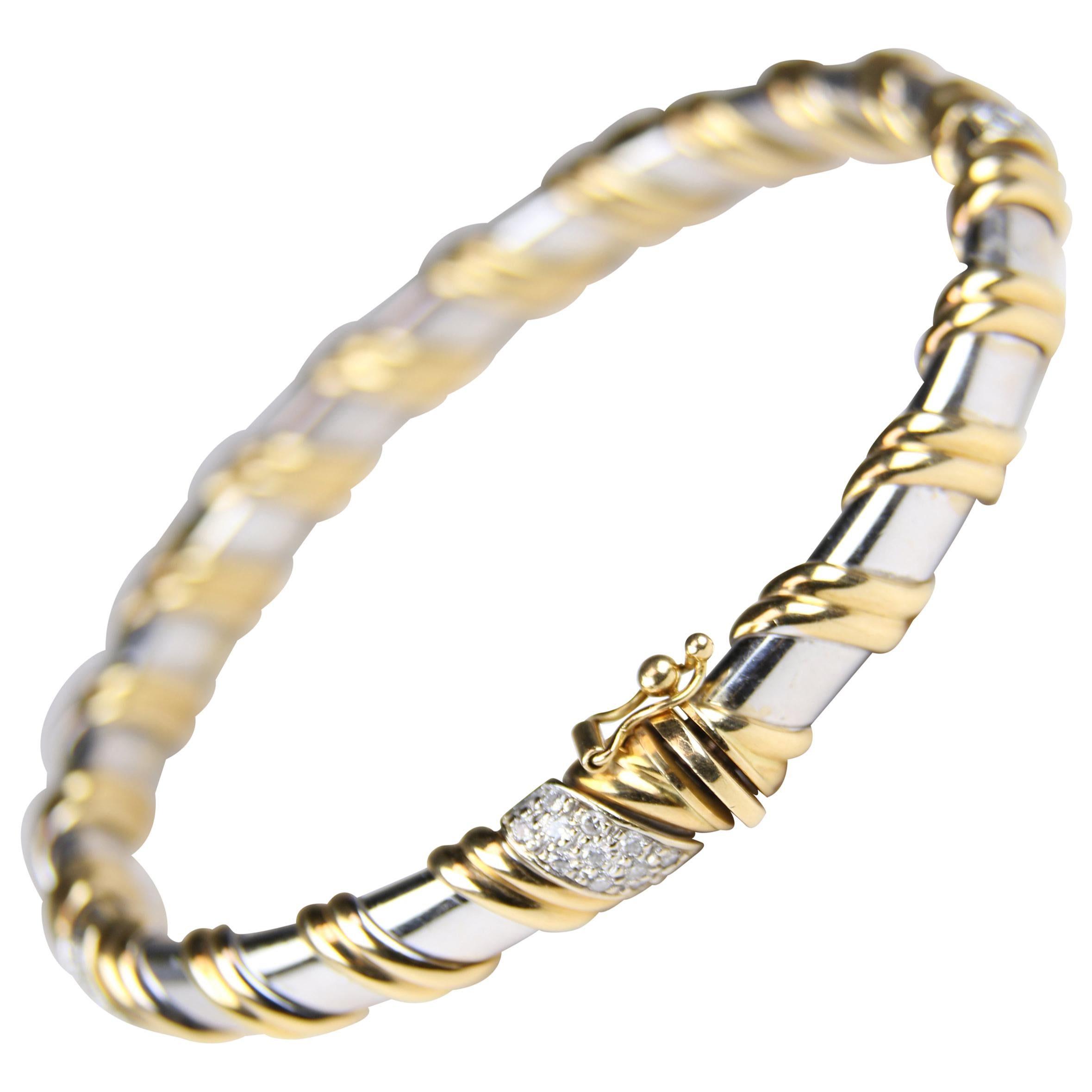 Bracelet jonc en or bicolore avec diamants en vente