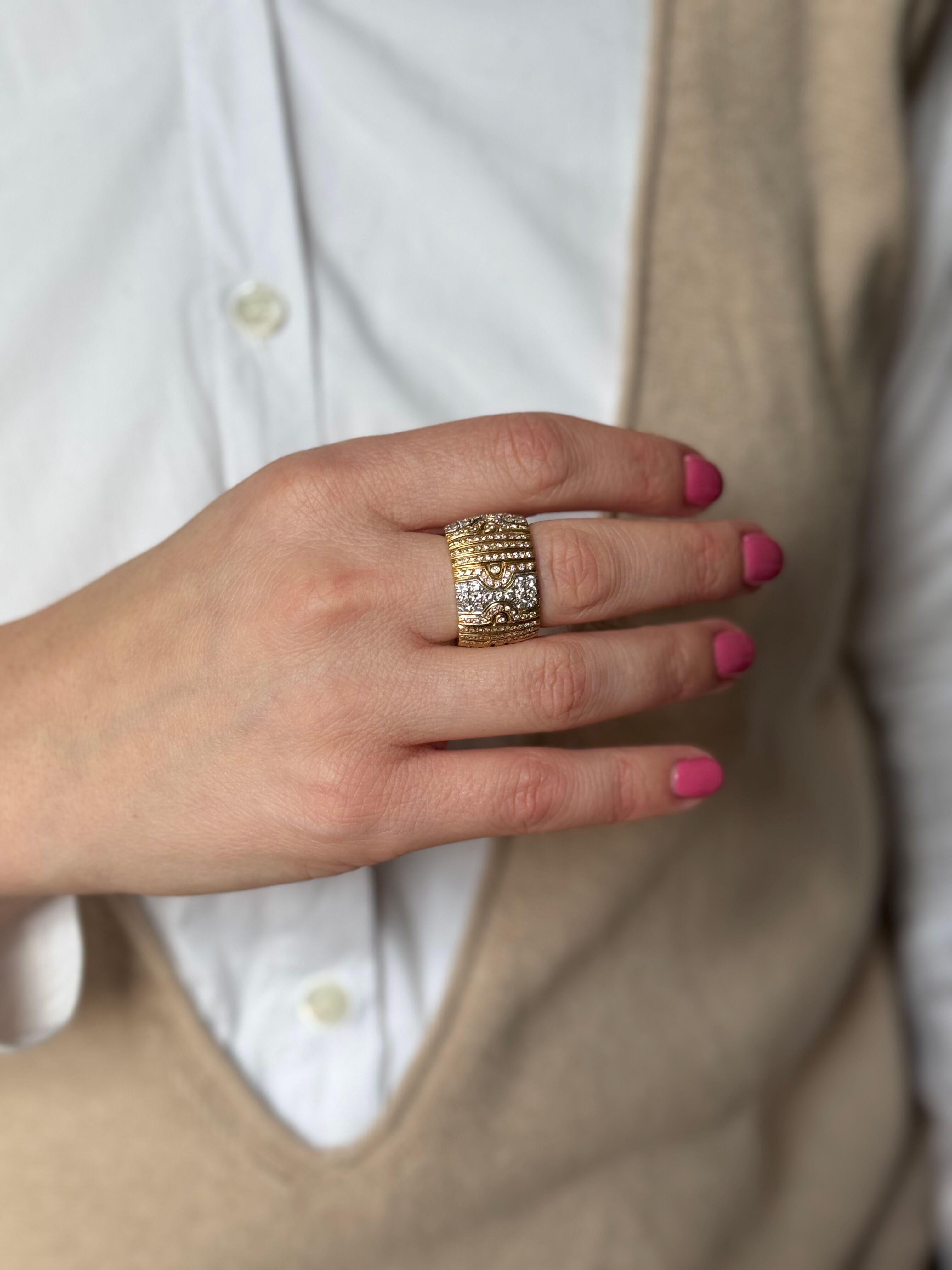 18k white and yellow gold wide band ring, set with all around set diamonds - total approx. 1.90ctw SI/H. Ring size 7.5, ring is 16mm wide. Tested 18k (not marked). Weight - 16.6 grams. 