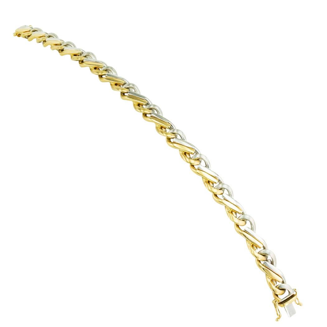 Two-tone gold link bracelet circa 1990. *

ABOUT THIS ITEM:  #B-DJ113D. Scroll down for specifications.  It is an elegant and very masculine take on the usual man’s link bracelet.  Each individual link displays a clear dichotomy between the gold