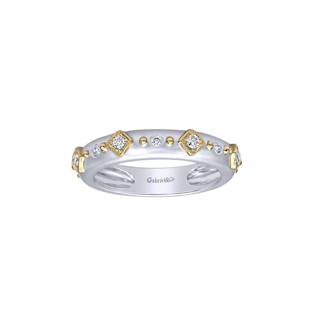Organic bezel set design with satin finish diamond band in 14k white gold. Band contains 0.08 ctw of fine white round brilliant cut diamonds, H color, SI clarity. Band is suitable as a one of a kind wedding band, a fashion ring, anniversary ring, or