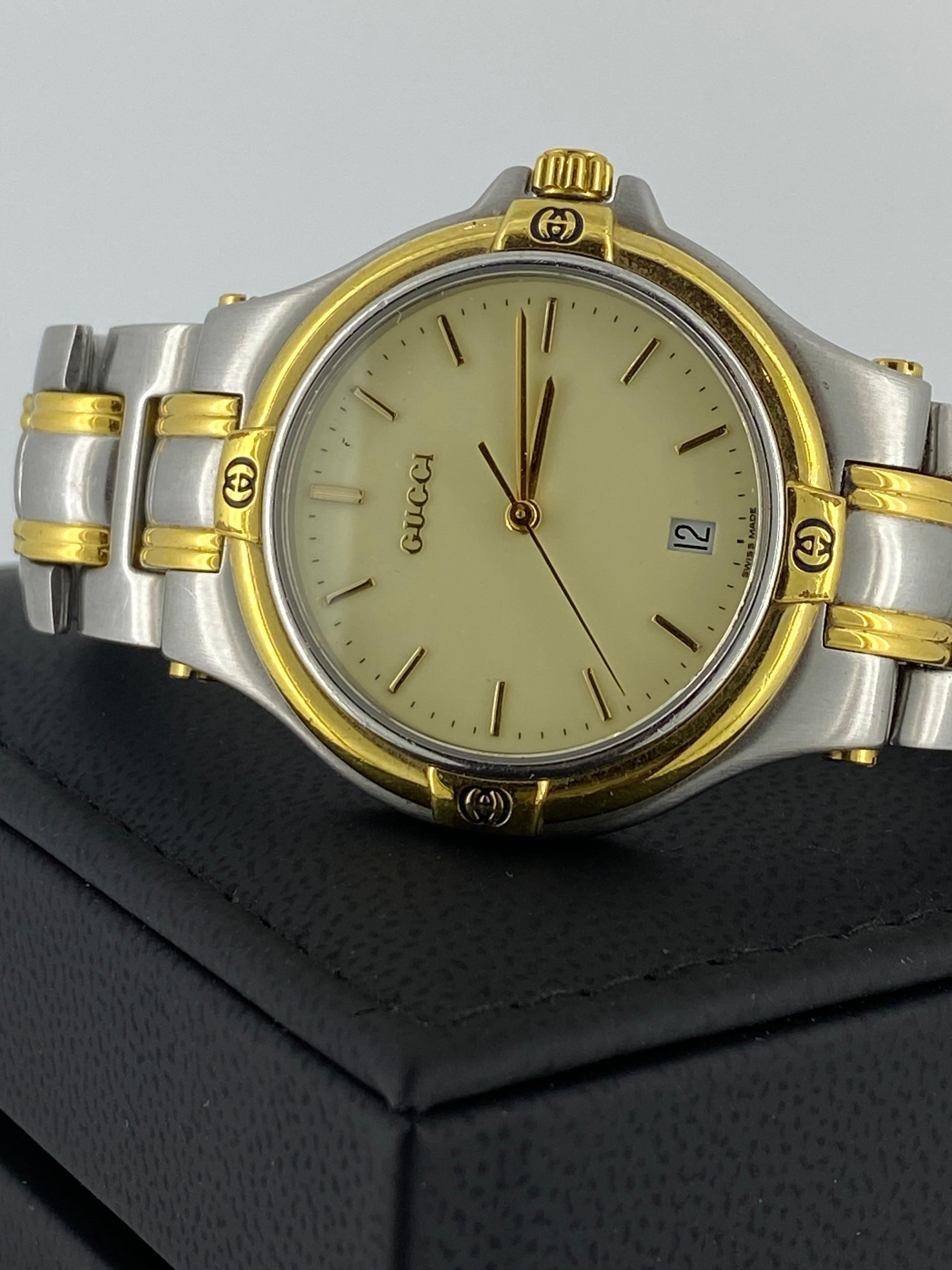 gucci golden watch