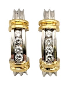 Orecchini a cerchio con canale e diamanti incastonati a J Gold in due tonalità, oro giallo e bianco