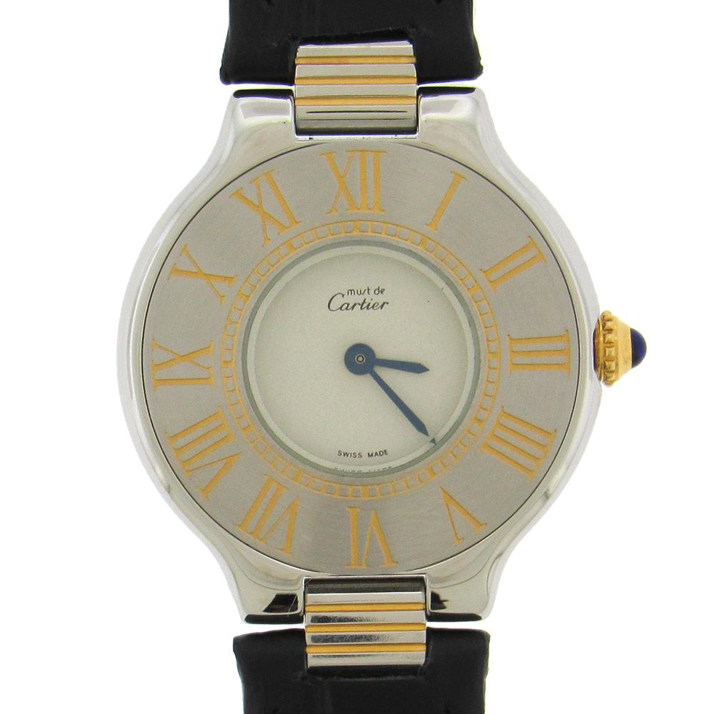 Two-tone stainless steel and gold vermeil women's Cartier Must de Cartier 21 wristwatch is slim round women's quartz wristwatch.  The 28mm case has a screwed-down steel back, two-tone steel and gold bezel with Roman numerals, sapphire crown.  the