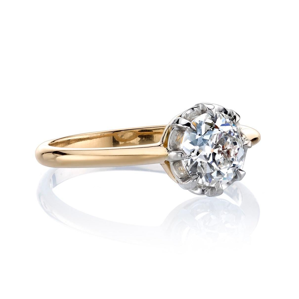 0.95ct I/SI2 GIA certified old European cut diamond set in a handcrafted platinum and 18K yellow gold mounting. Ring is currently a size 6 and can be sized to fit. 