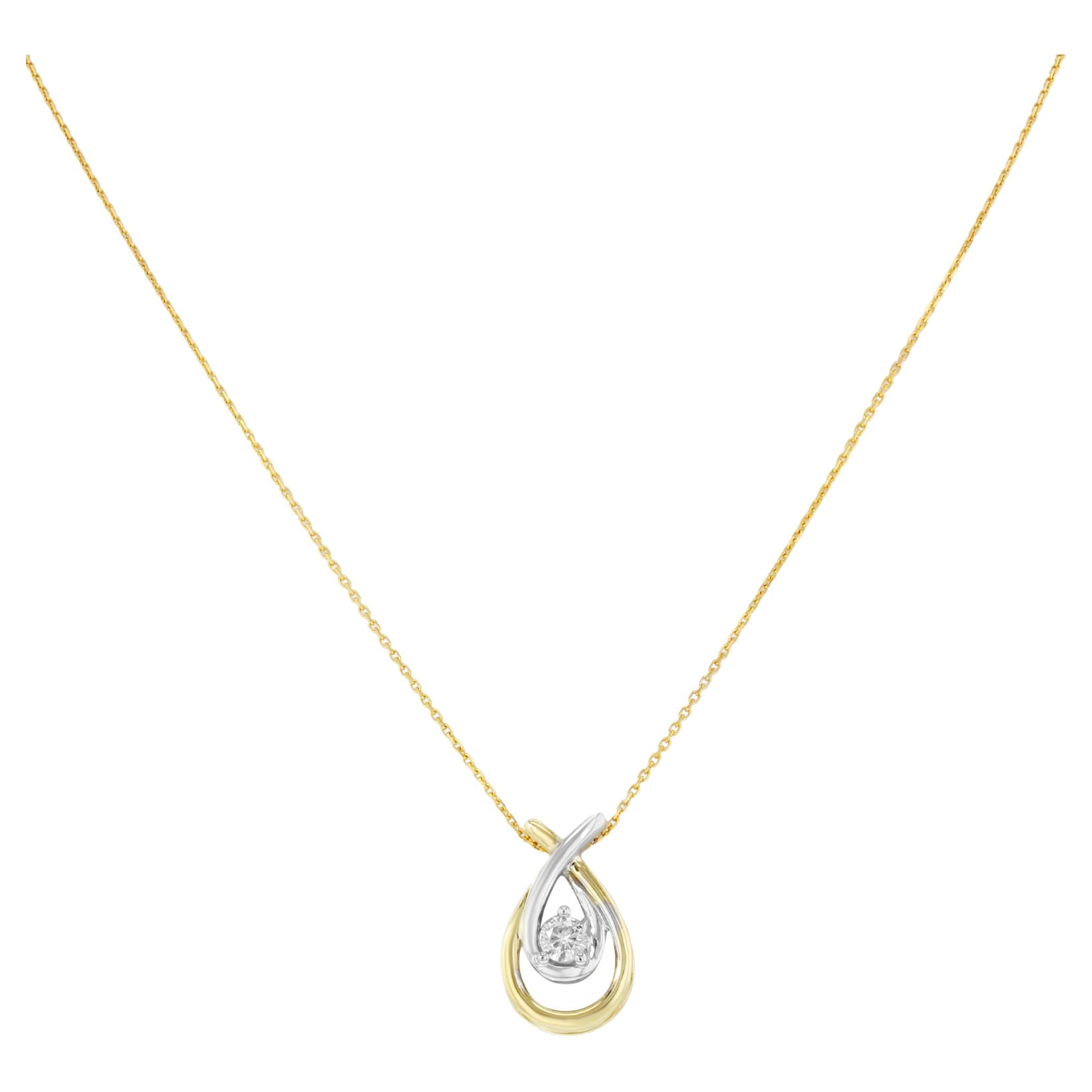 This gorgeous necklace comes in 14k yellow gold chain with 10k yellow & white gold pendant encrusted with 0.15 cttw diamond. Length of the necklace: 18 inches, pendant: 19mm, total weight 2.9 gms. Comes with a gift box and an appraisal card.