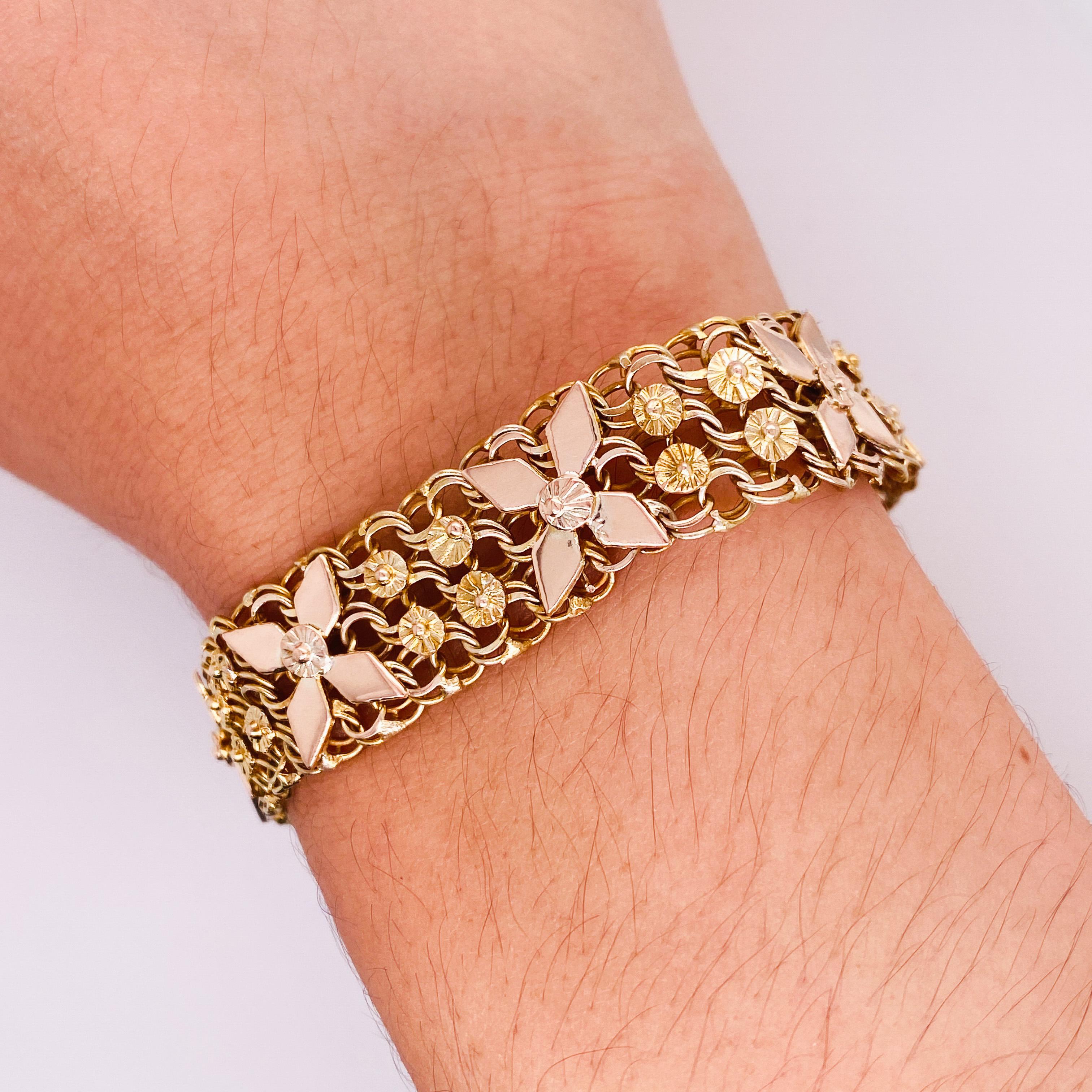Ten pinwheels in rose gold seem ready to spin as they lay along the top of this wide yellow gold bracelet. Dainty double links form the backdrop to the pinwheels and make the bracelet seem delicate. Small floral discs accent the pinwheel centers and
