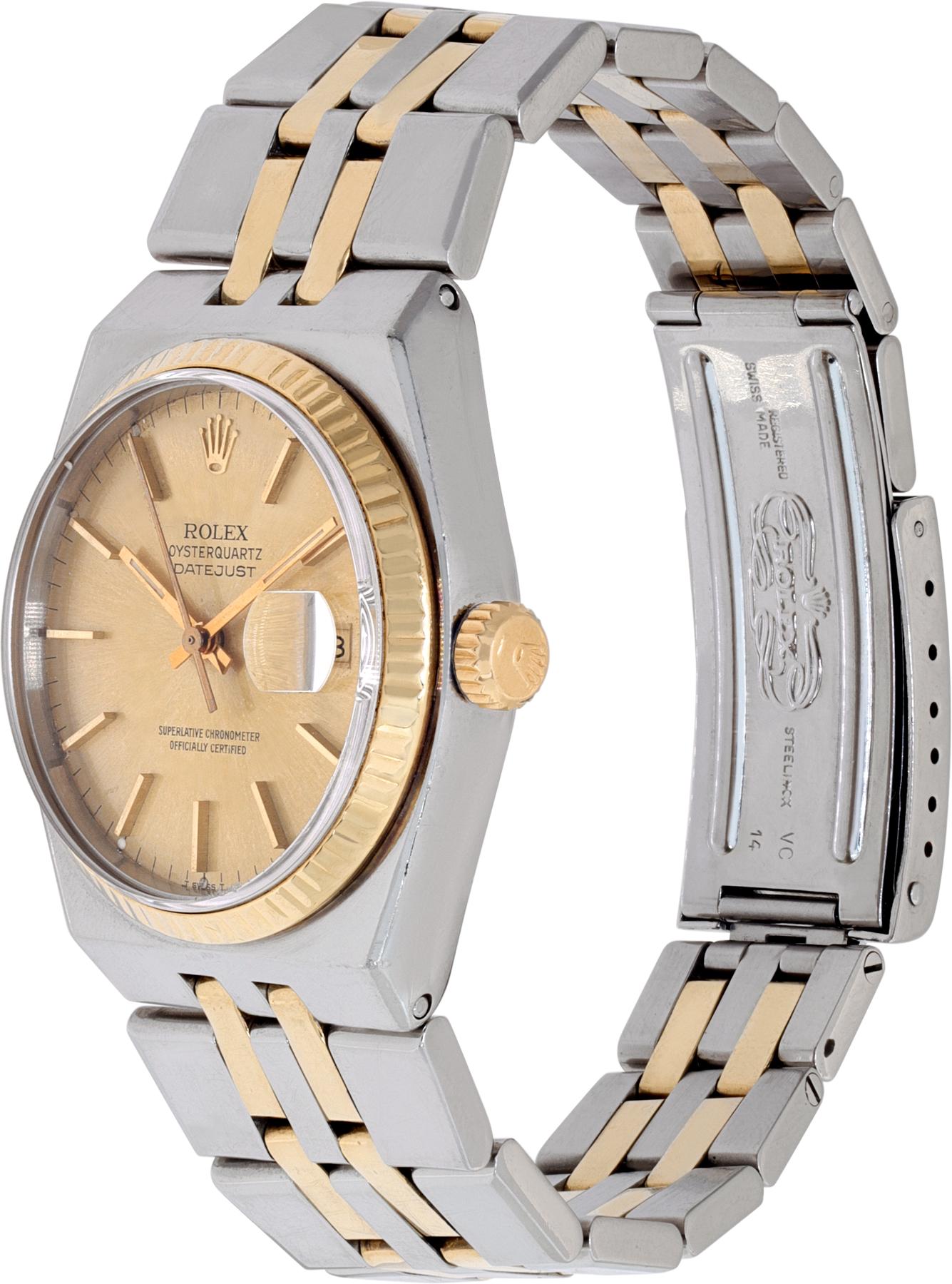 Rolex Datejust Oysterquartz in 14k & stainless steel with gold stick dial. Dial has discoloration and patina. One link has dent. Quartz w/ sweep seconds and date. 36 mm case size. Ref 17013. The first version of the Oysterquartz circa 1978 ** Bank