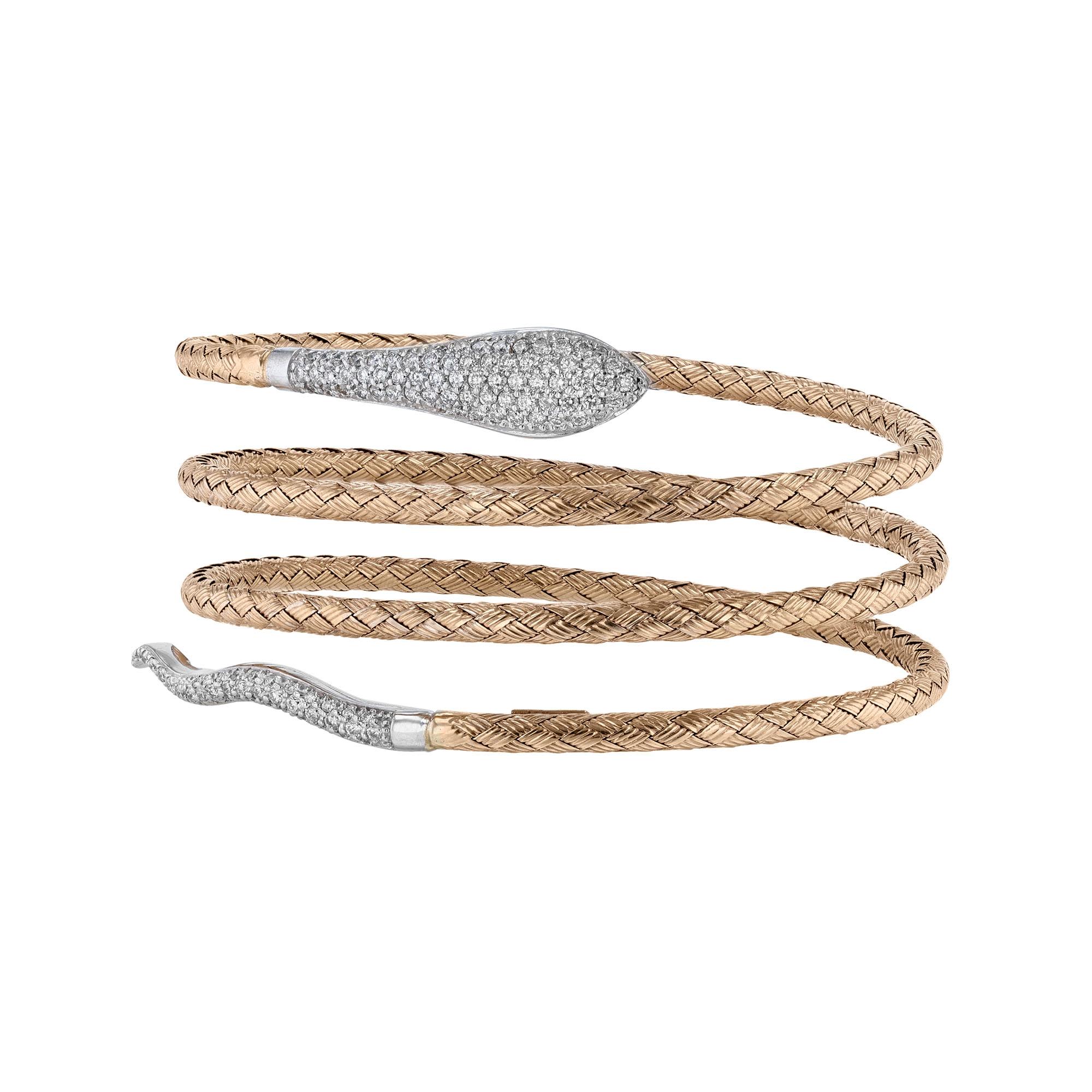 This bangle is made in 18K white and rose gold and features 110 round cut, pave' set diamonds weighing 1.00 carat. This bangle has a color grade (H) and a clarity grade of SI2.