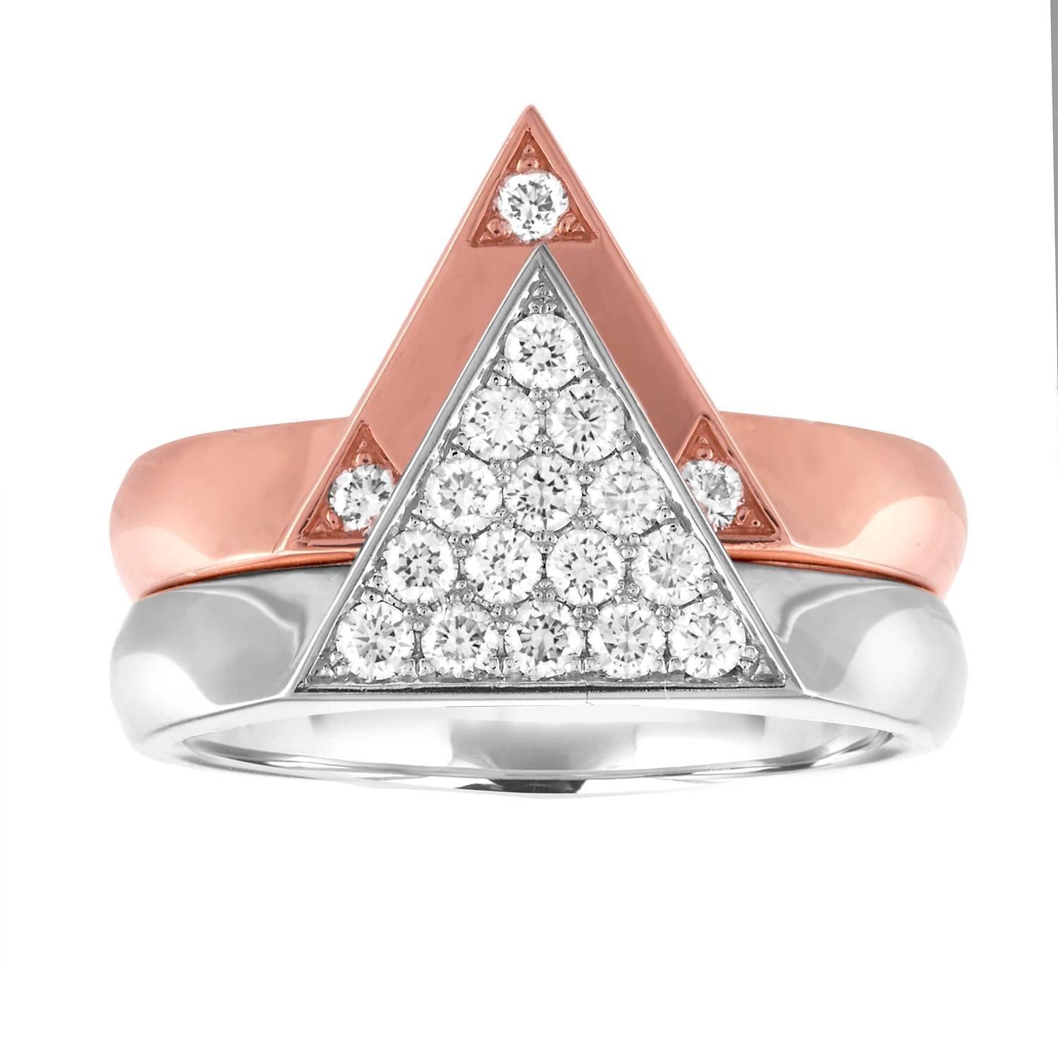 Very Unusual and Modern Star of David Ring
The ring is 14K White And Rose Gold
There are 0.55 Carats in Diamonds F VS
The ring can be worn as a 