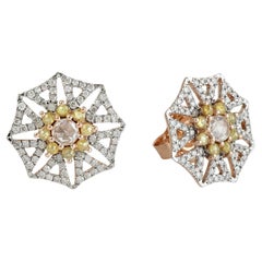 Boucles d'oreilles en or 18 carats avec diamants en forme d'étoile