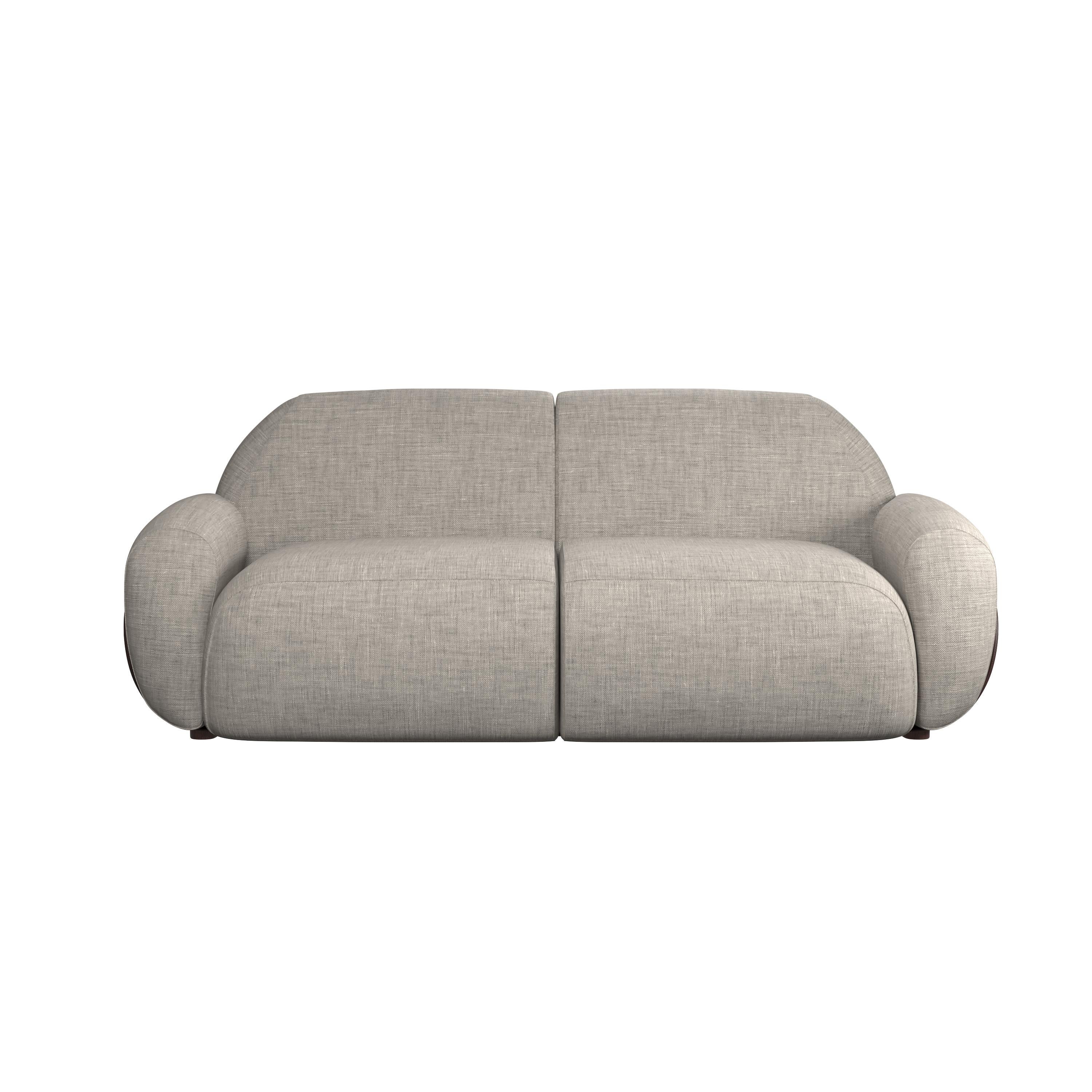 Das Zweisitzer-Sofa Kiritsu ist ein Meisterwerk an Design und Handwerkskunst, inspiriert von den disziplinierten Traditionen des alten Japan. Dieses luxuriöse Möbelstück verbindet zeitgenössische Ästhetik mit unvergleichlichem Komfort und ist damit