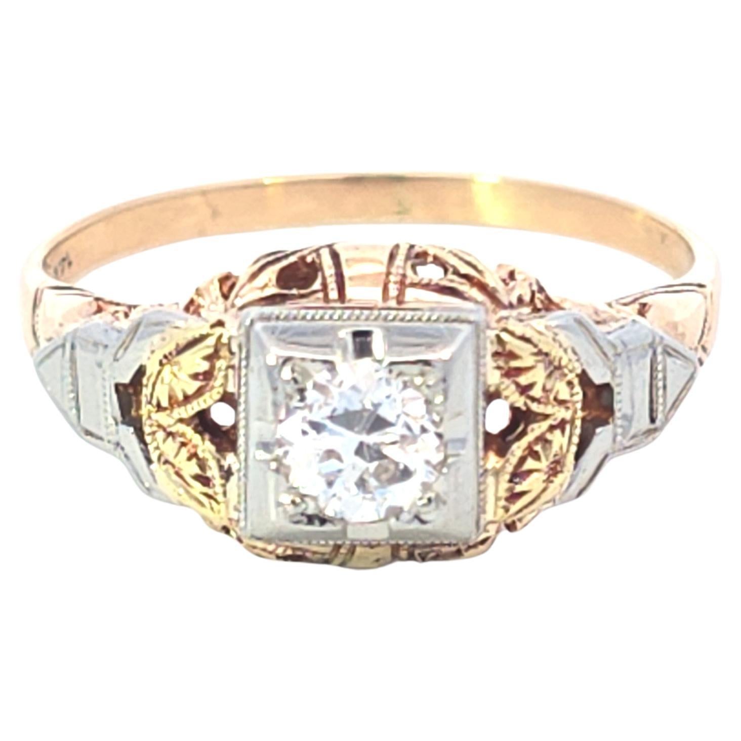 Anello con diamante vintage bicolore