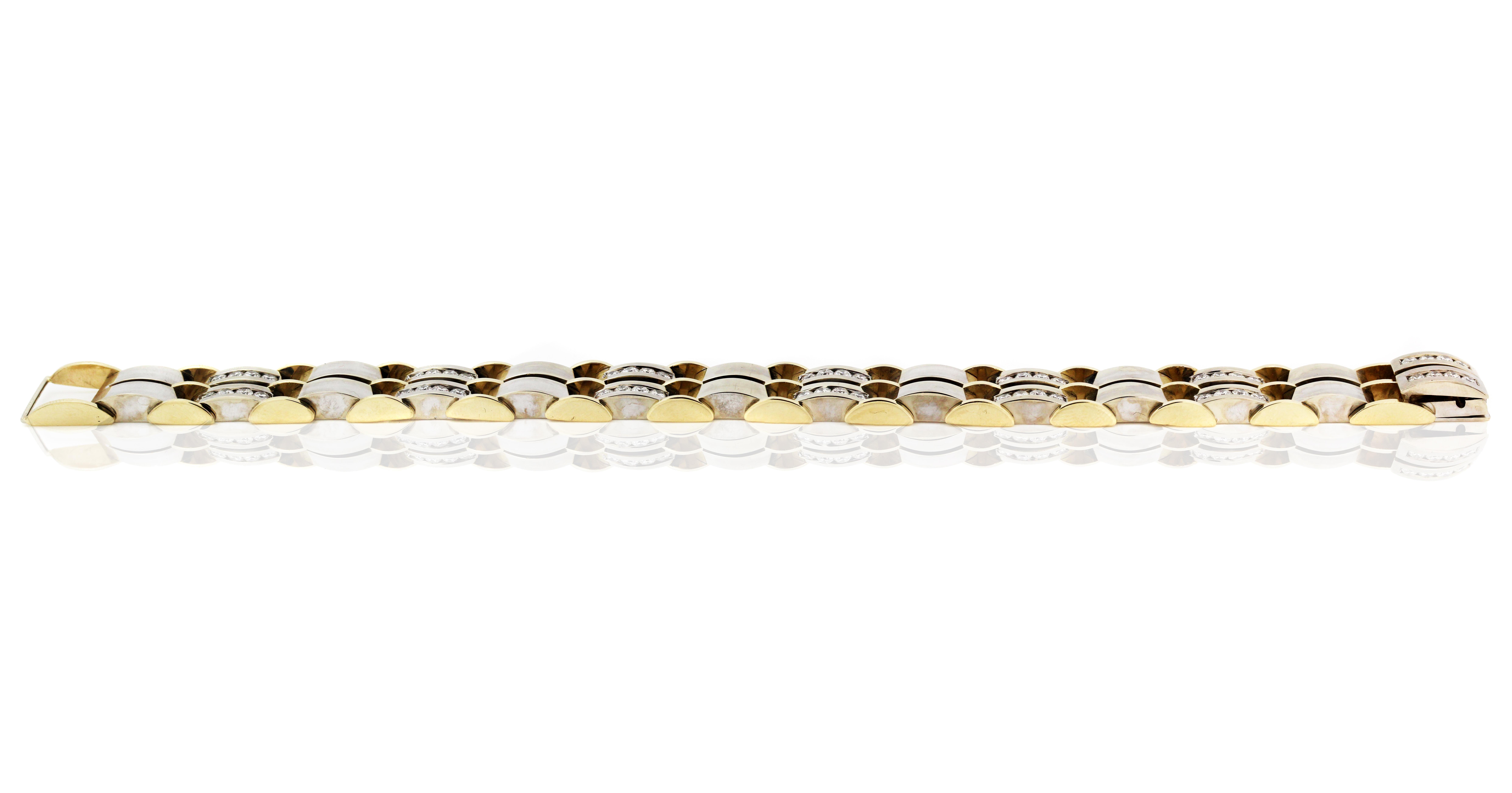 14K Yellow and White Gold Mens Bracelet with Diamonds

4.50 carat G color VS clarity diamonds 

Great weight on the bracelet, 94.2 grams gold

As shown in photos, lock is very secure and clicks right into its place with gorgeous design

9 inches in
