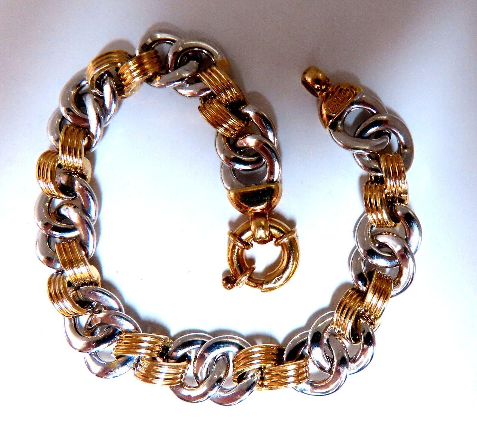 Looping Chain Link Bracelet

Durable, Well Made

14kt. yellow / White gold

15 Grams.

7.5 inch long

10mm wide 