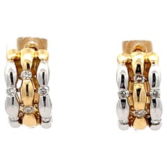 Boucles d'oreilles en or jaune et blanc 14k avec diamants bicolores