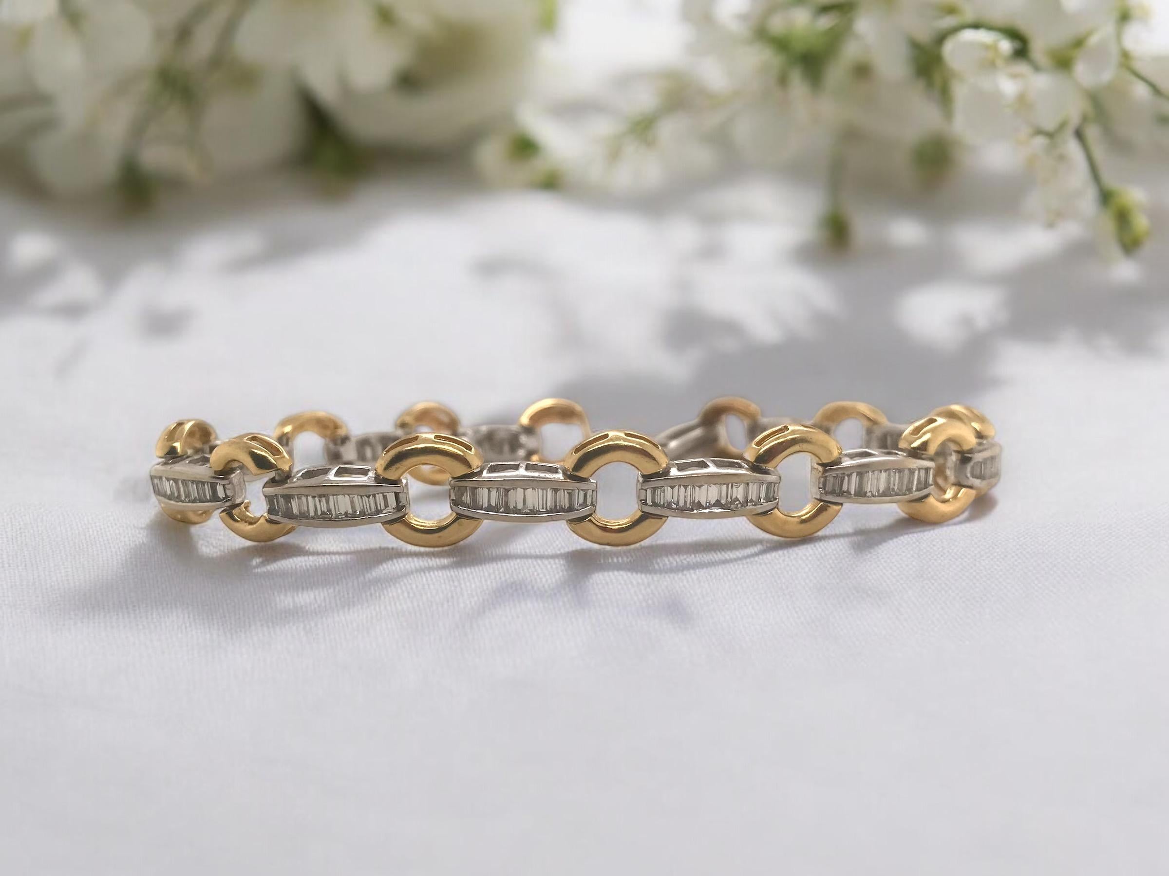 We always love a unique tennis bracelet!
This beauty is no exception. 
A great twist on a classic design.

Bracelet Details
Material: 14K White & Yellow Gold
Length: 7 Inches
Width: 9.3mm
Weight: 16.1 Grams

Accented by the following gemstones
96 -