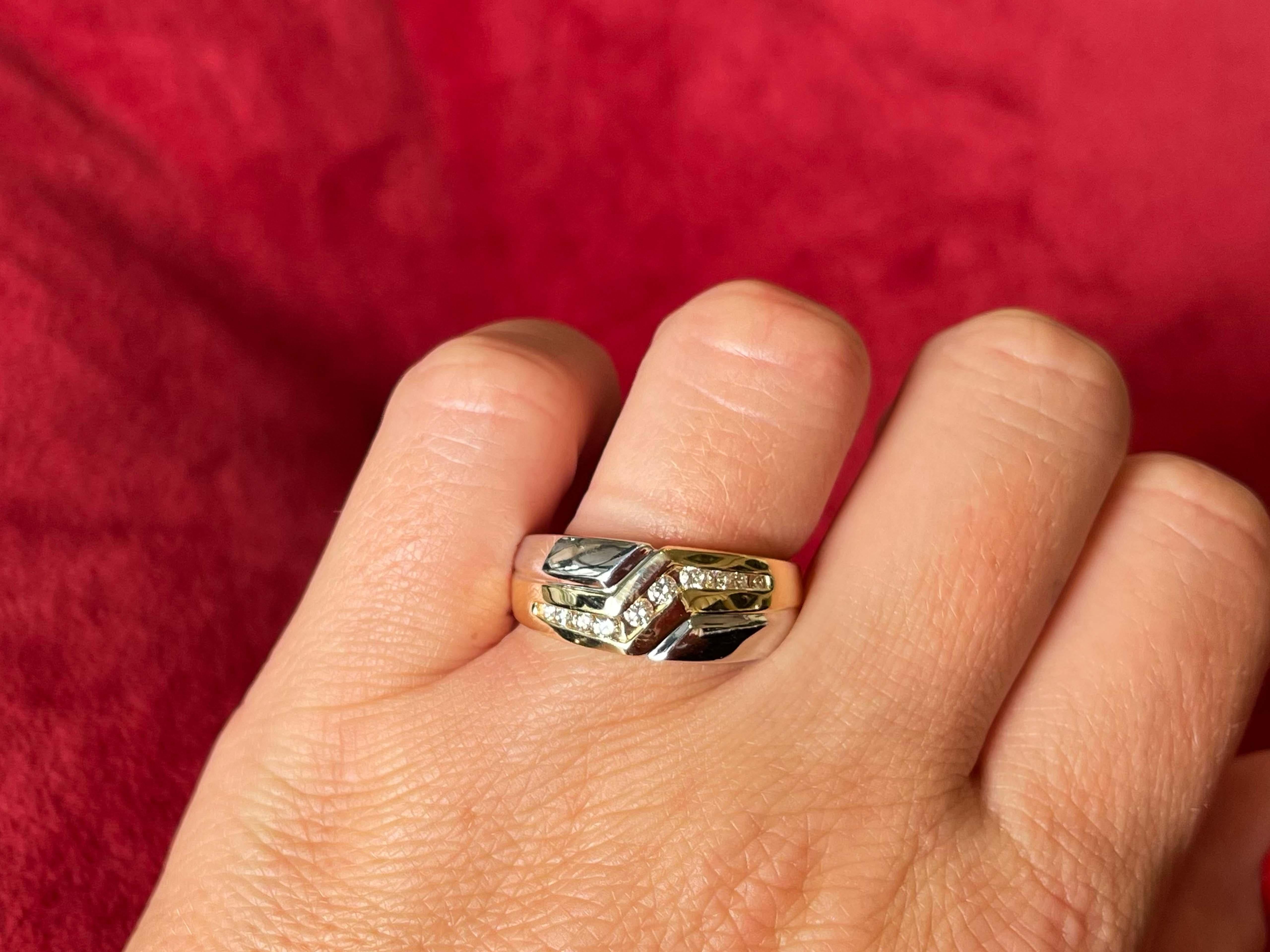 Item Specifications:

Metal: 14K Yellow Gold

Total Weight: 9.3 Grams

Ring Size: 9.75

Diamond Count: 10 Brilliant cut diamonds

Diamond Carat Weight: ~0.18 Carat

Diamond Color: G

Diamond Clarity: SI1-SI2

Condition: Preowned, excellent

Stamped: