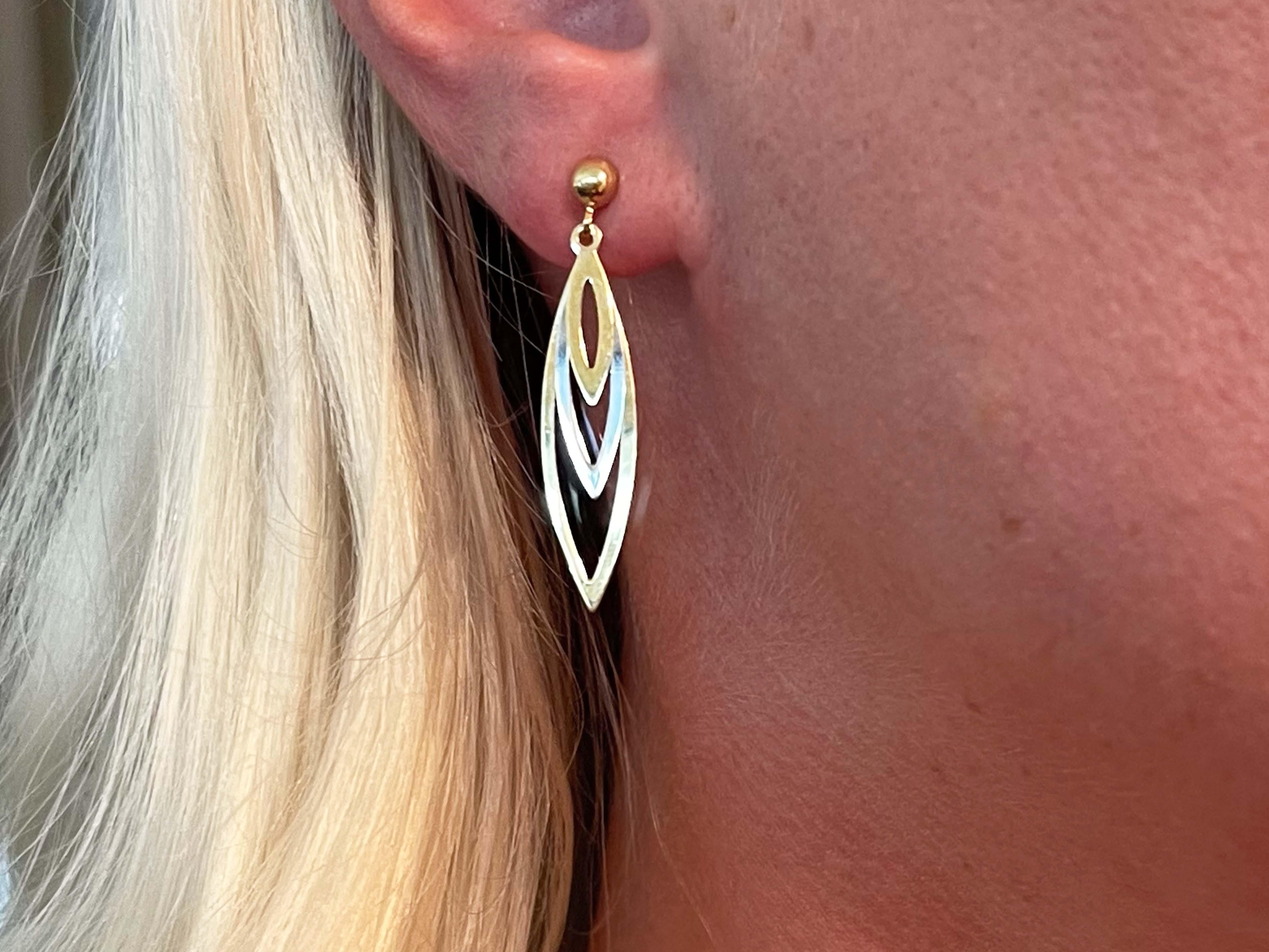 Earrings Specifications:

Metal: 18K White and Yellow Gold

Total Weight: 2.5 Grams

Earring Length: ~1.4