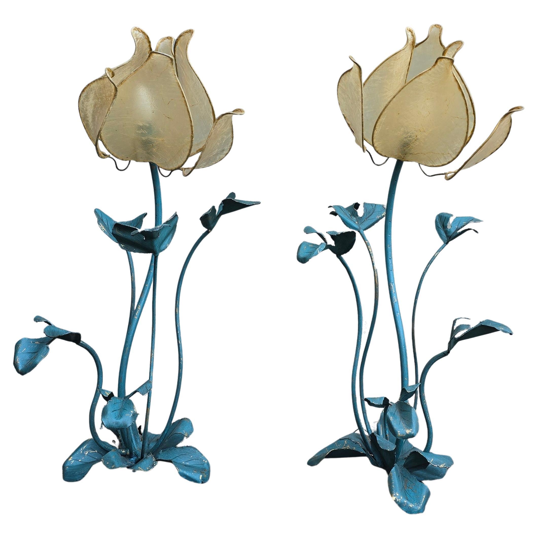 Set of two vintage flower lamps with pig bladder shades.

Unique set of two special table lamps in the shape of flowers. The shades are made of pig bladder, a rare artisanal material that provides a warm, diffuse glow. The frame and the graceful