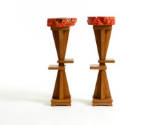 Two unique mid-century standing ashtrays consisting of red Alabaster cup