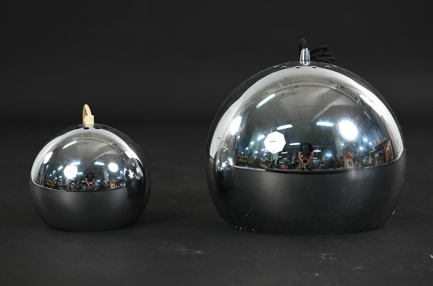 Two Danish mid-century chrome finish metal pendant lights in the manner of Verner Panton.