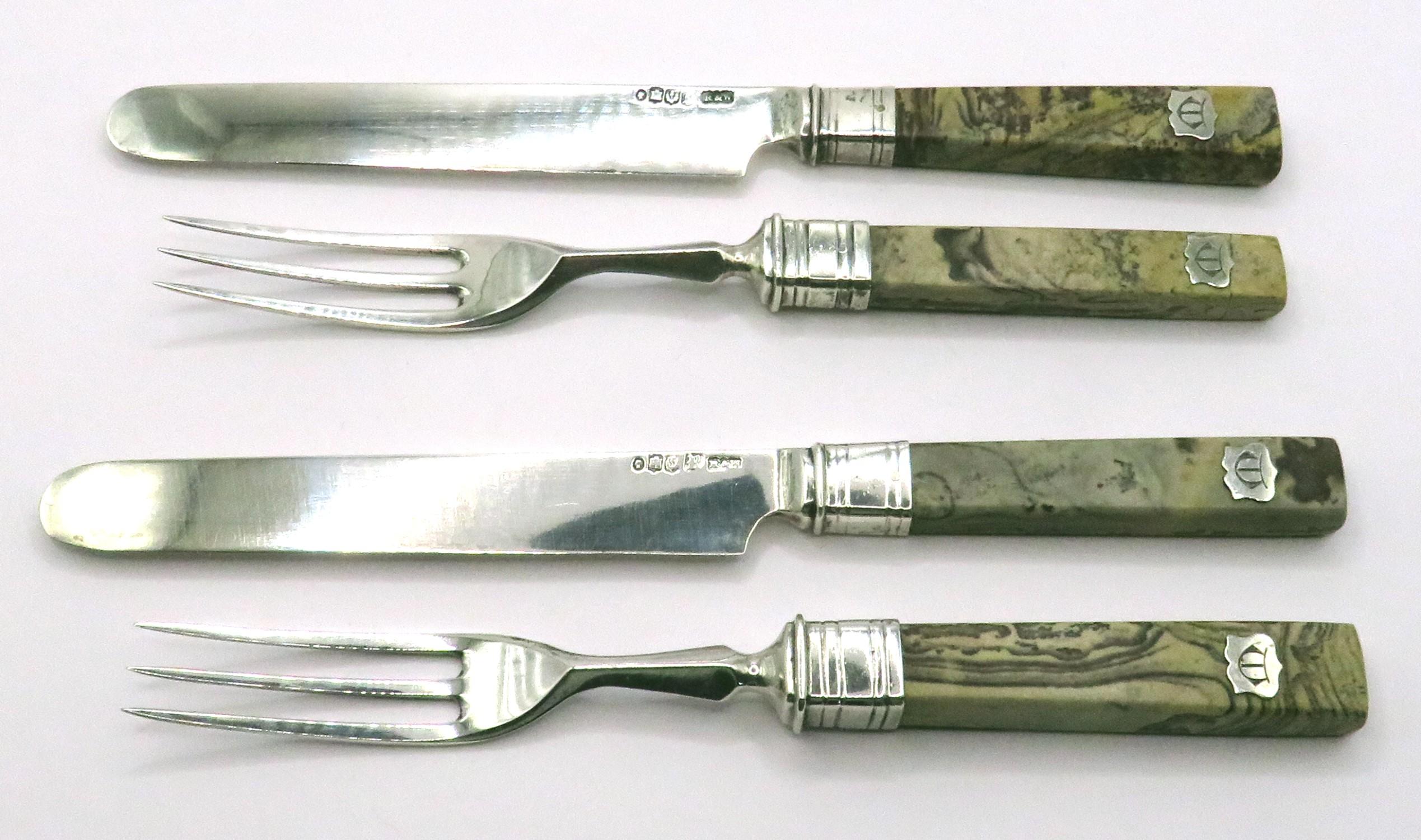 Both pairs of these handsome agate handled fruit knives & forks are fitted with sterling silver blades & tines, all bearing Edinburgh hallmarks with date letter for 1848 and makers marks for noted Scottish silversmiths Robb & Whittet. 
All four are