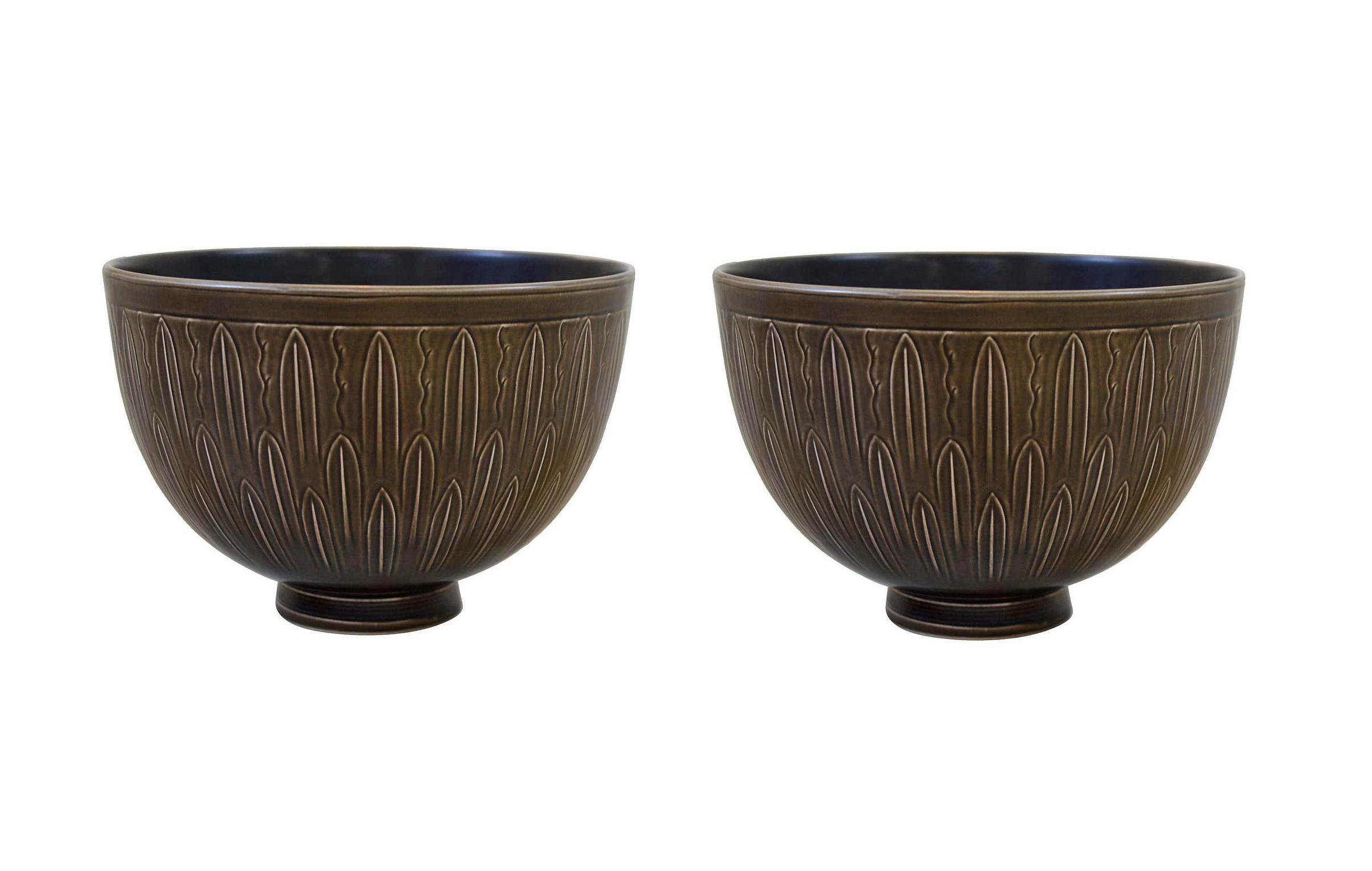 Two large and rare bowls from the ‘Solbjerg’ series, from Nils Johan Thorvald Thorsson (1898–1975) earlier work for Aluminia and marked. Measures: Ø 28.5 x H 19.5 cm.

Nils Johan Thorvald Thorsson is regarded as one of the best designers of Royal