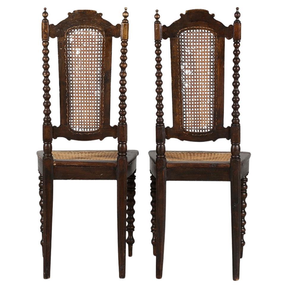 Pair of Victorian chairs with cannage. 