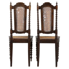 Antique Pair of Victorian chairs with cannage.
