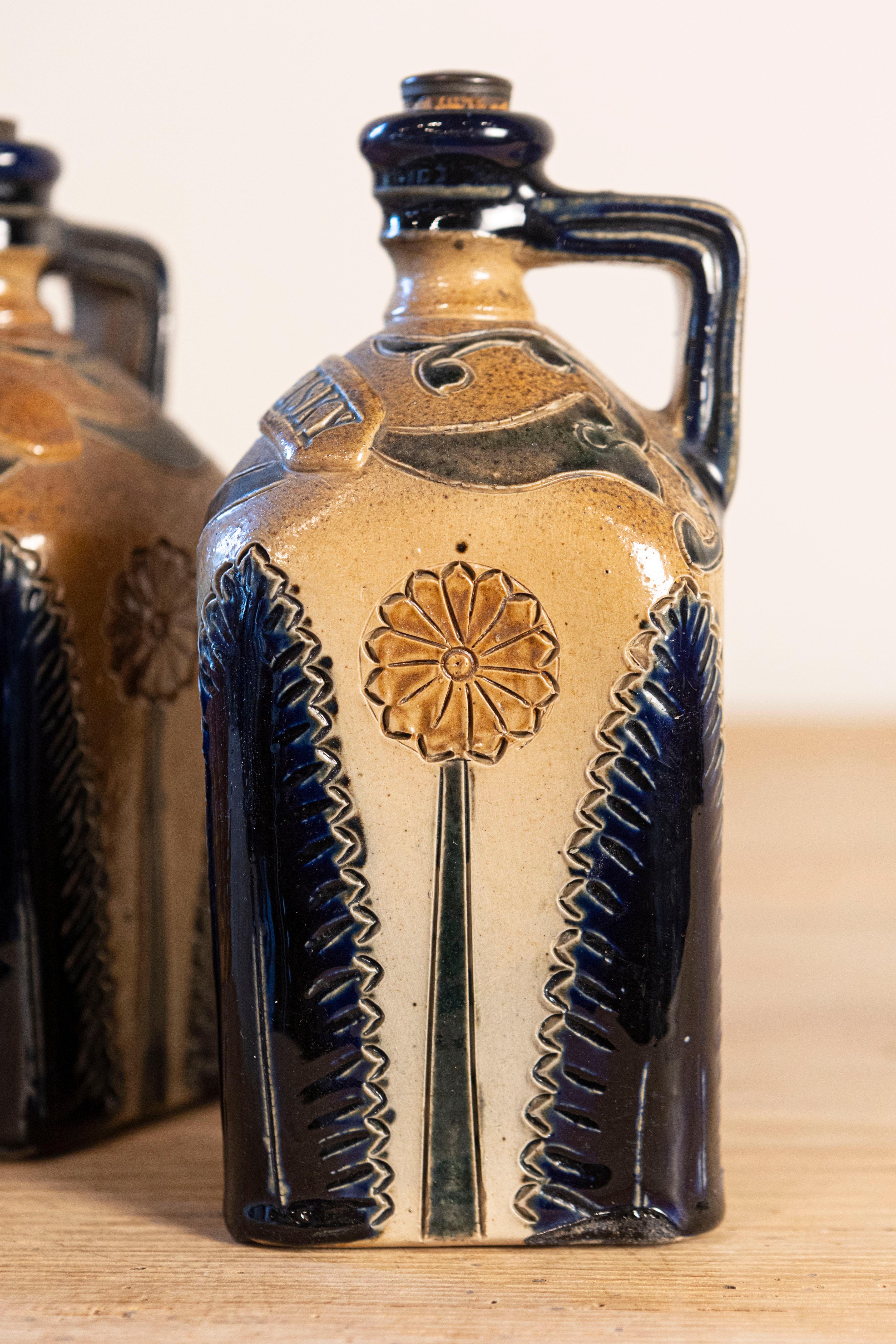 Two Victorian English Pottery Decanters in Tantalus-Inspired Wicker Basket For Sale 1