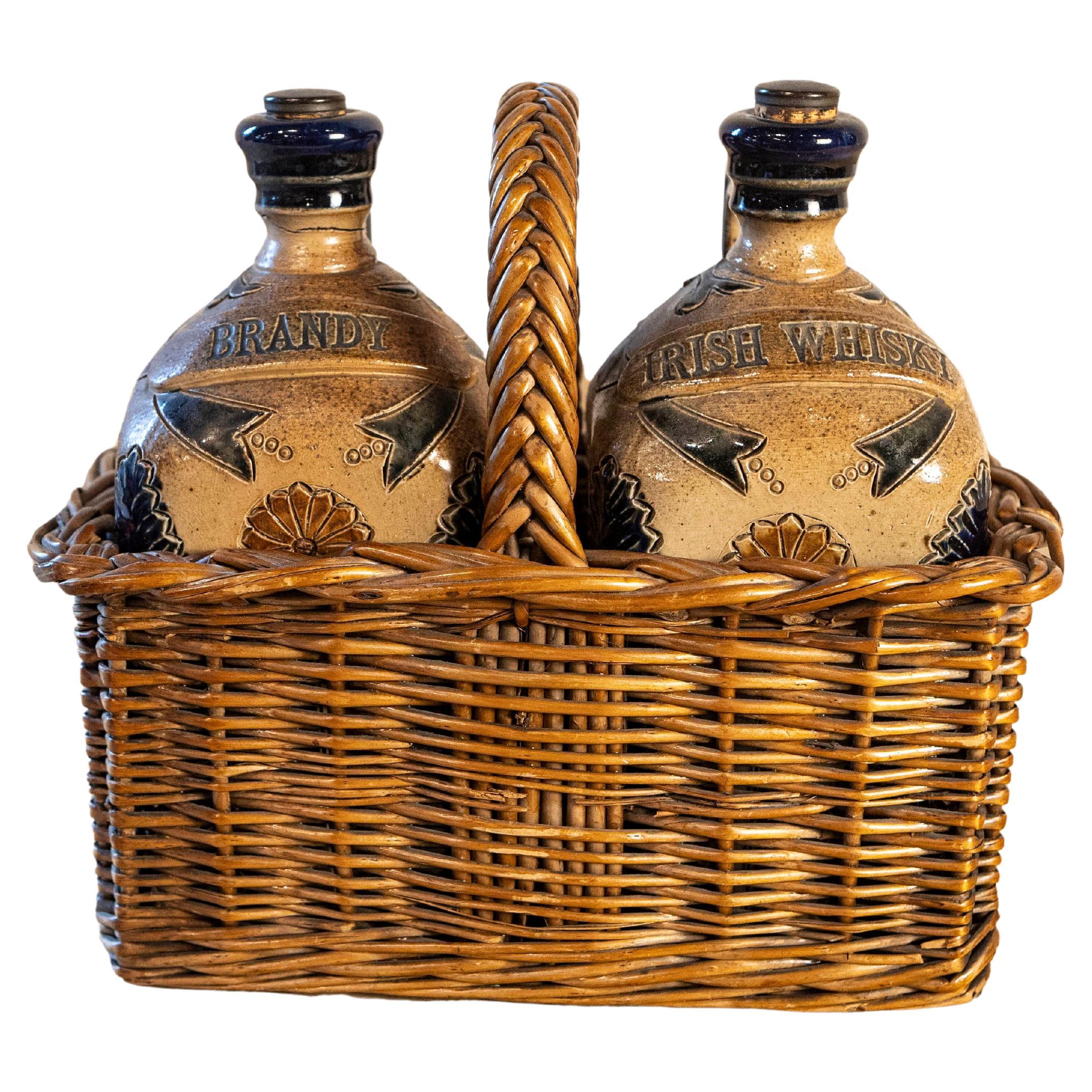 Two Victorian English Pottery Decanters in Tantalus-Inspired Wicker Basket For Sale