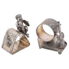 Two Victorian Silverplate Figural Napkin Rings