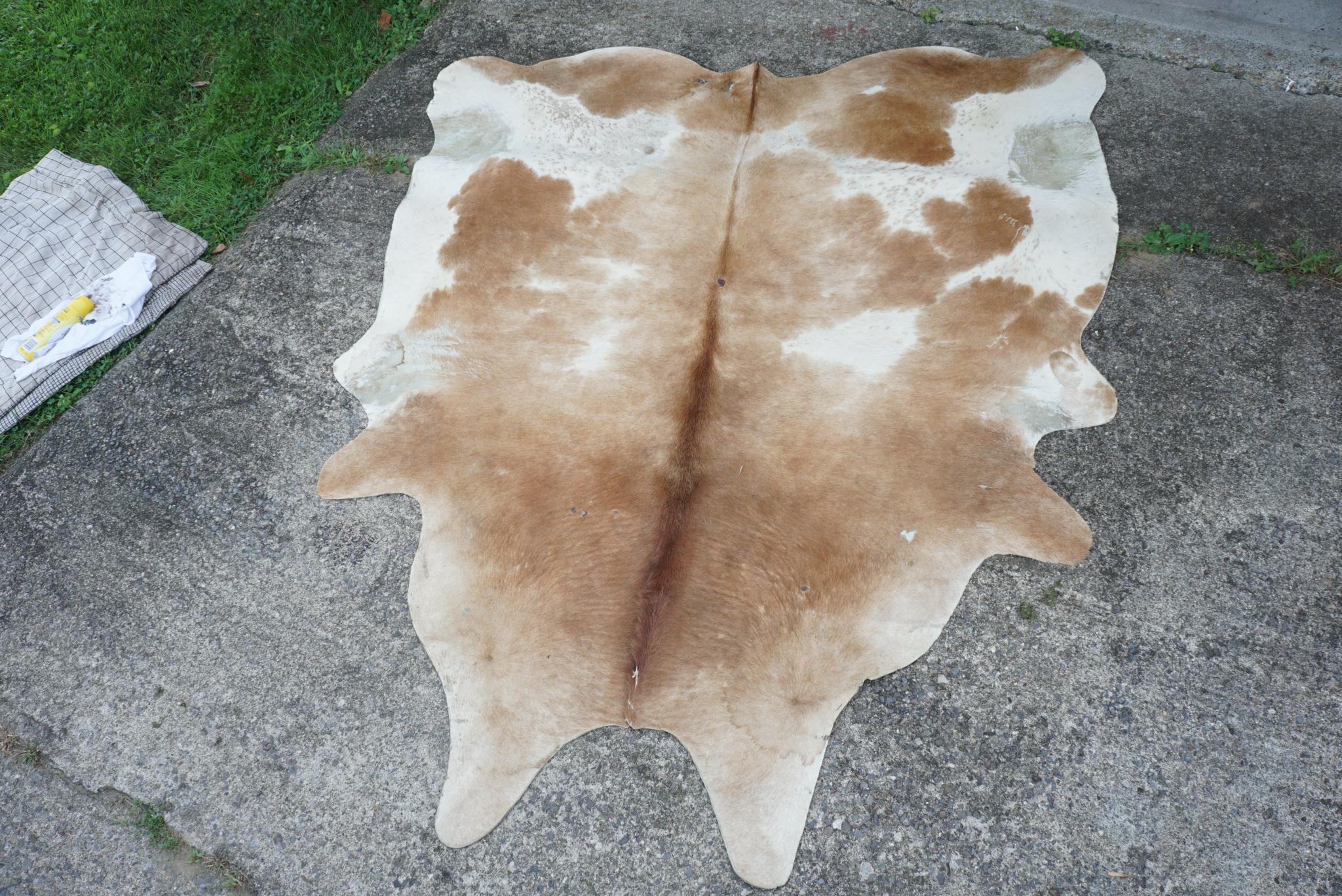 Hide Two Vintage 1950s Cowhide Rugs