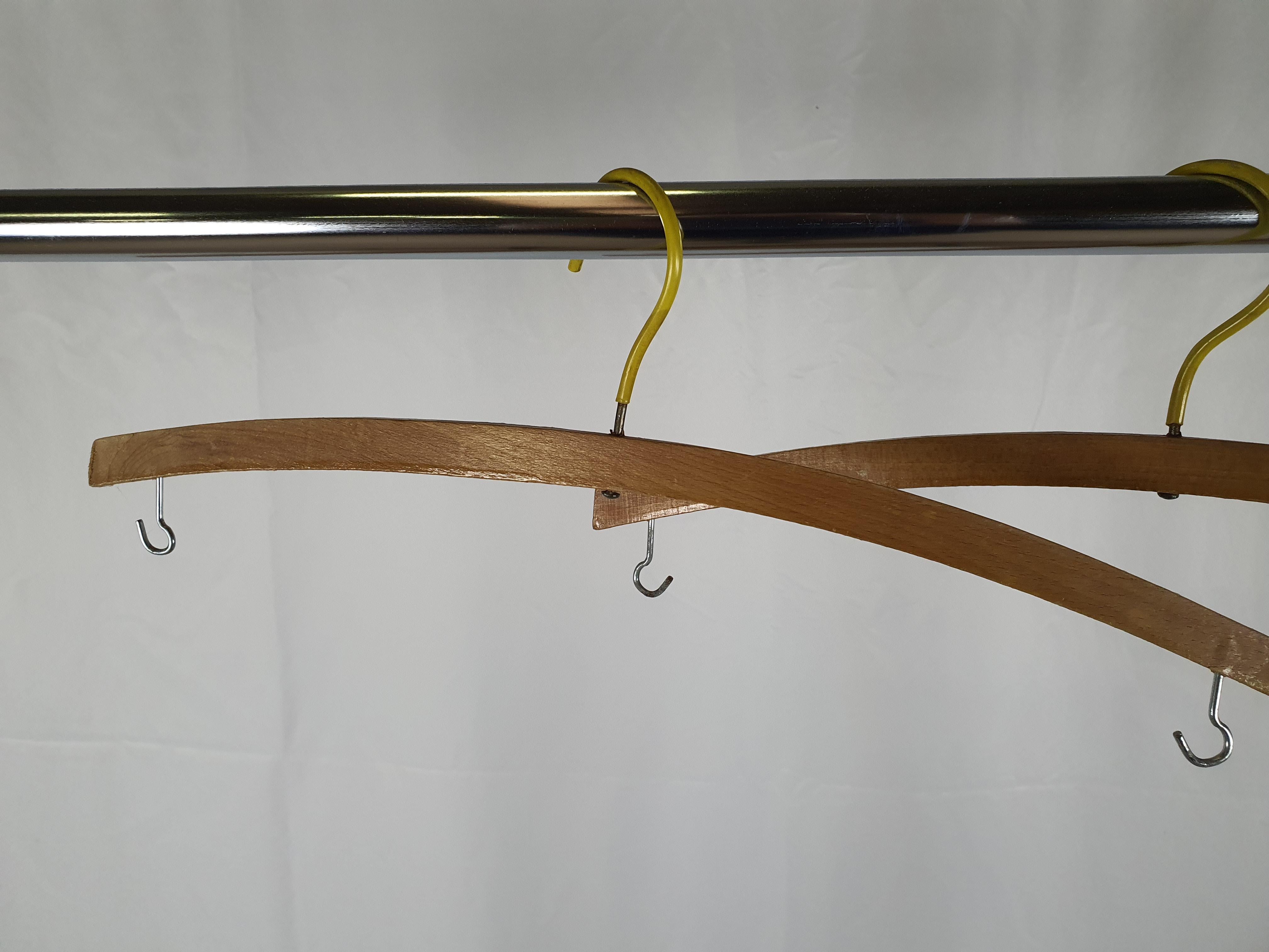 Pair of vintage hangers from the 1950s, entirely in wood with iron hanger.

Solid and robust, they can also be used as furnishing and design elements hung in various rooms of the house.