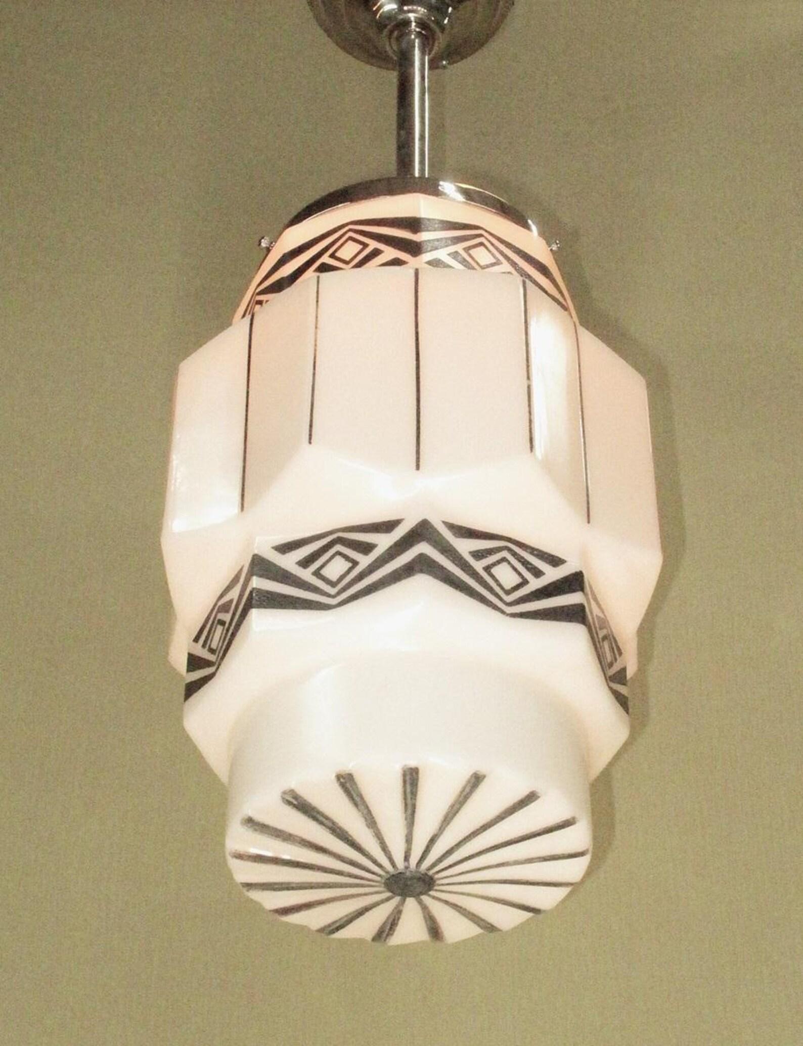 Fired Two Vintage Art Deco Pendants with Black Designs on Milk Glass priced each For Sale