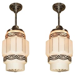 Two Vintage Art Deco Pendants with Black Designs on Milk Glass priced each