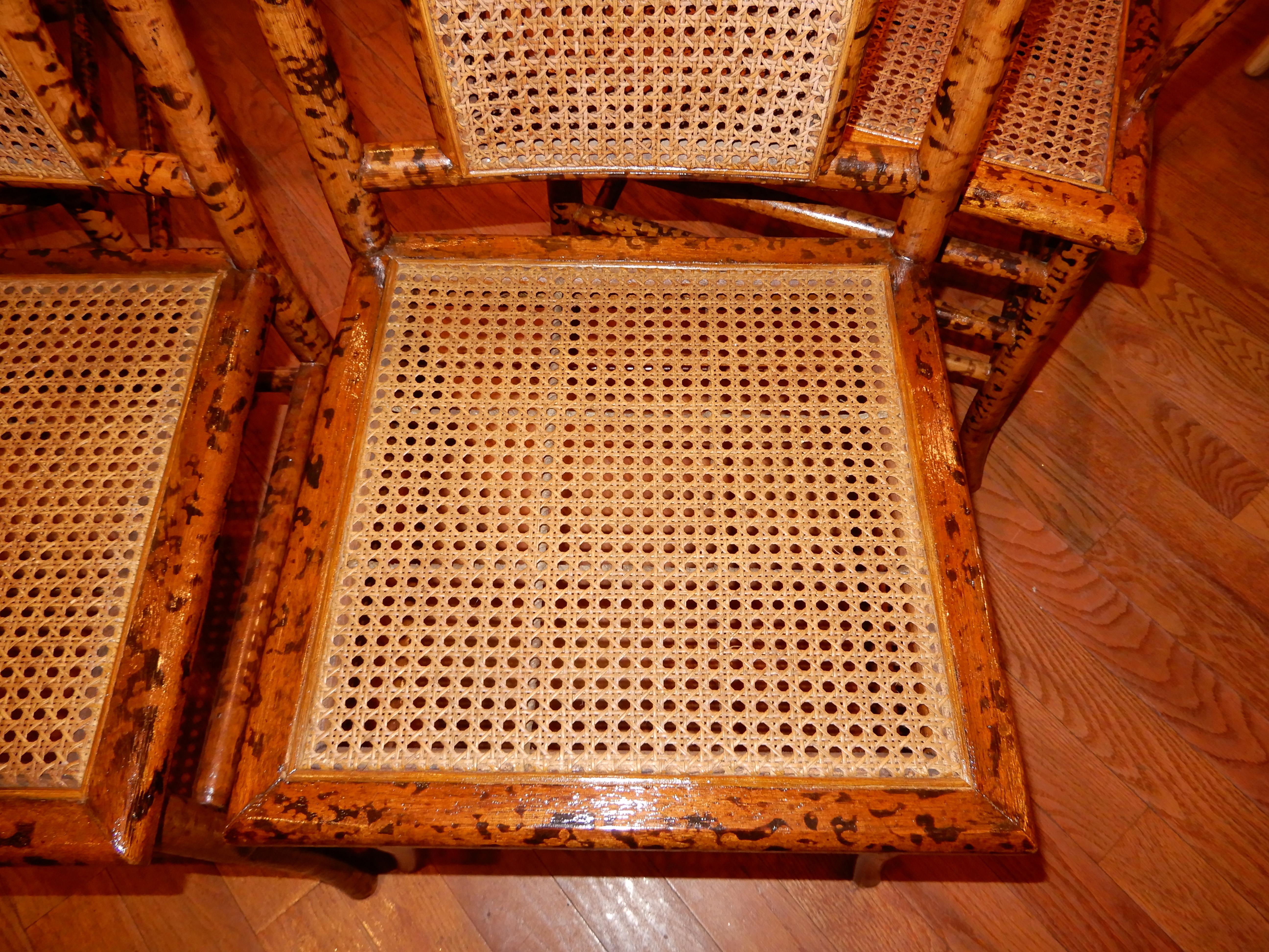 Two vintage bamboo and cane handcrafted chairs,priced for the pair.
The bamboo frames have the classic torched flamed work throughout, original cane seats in immaculate condition, click through to see the selected bamboo table.