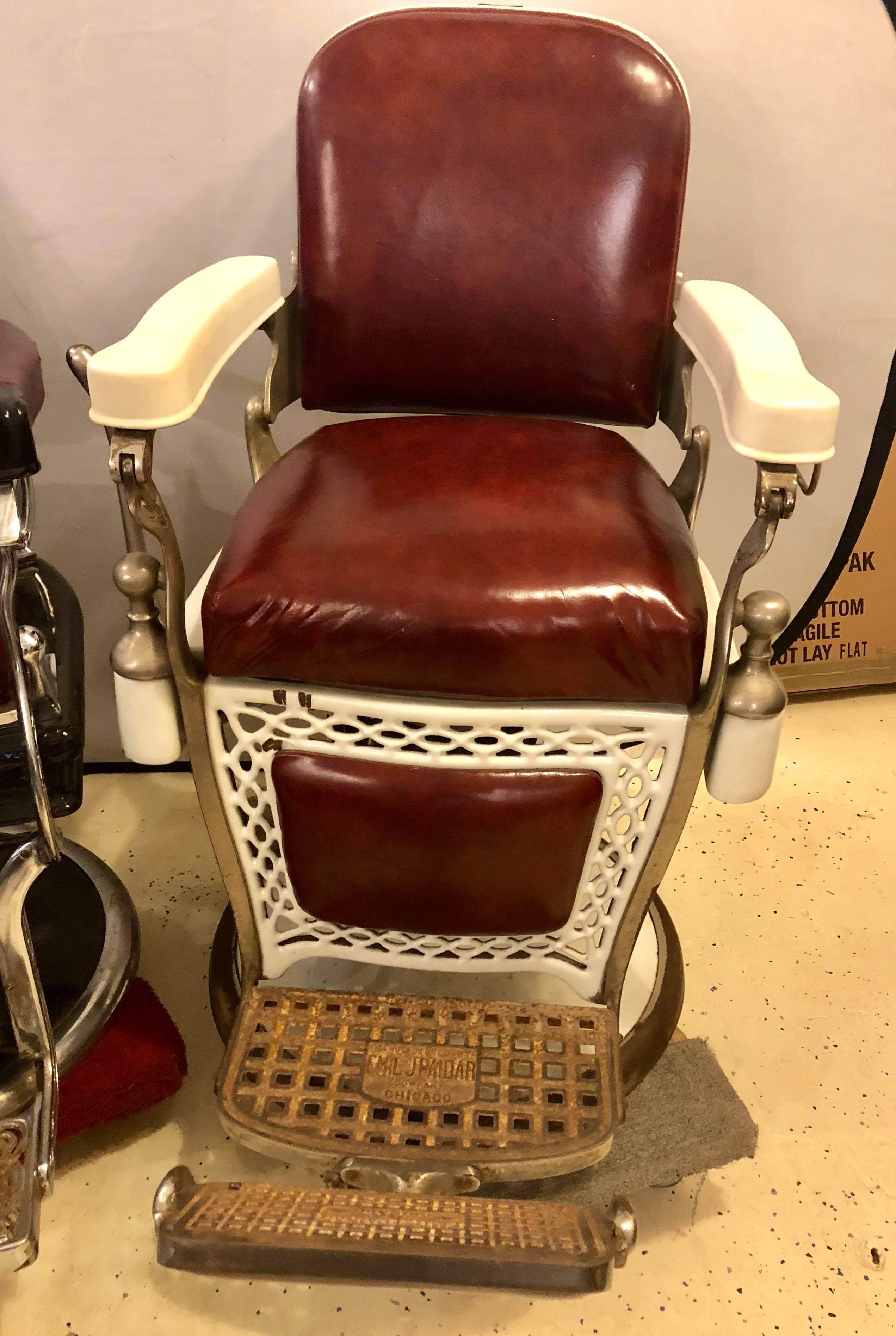 Two vintage barber chairs. Seat height is adjustable. One by Emil J. Paidar One by Koken.
Measurements for the white chairs are 40 H, 45 D, 30 W
Measurements for the black chairs are 40 H, 50 D, 30 W.